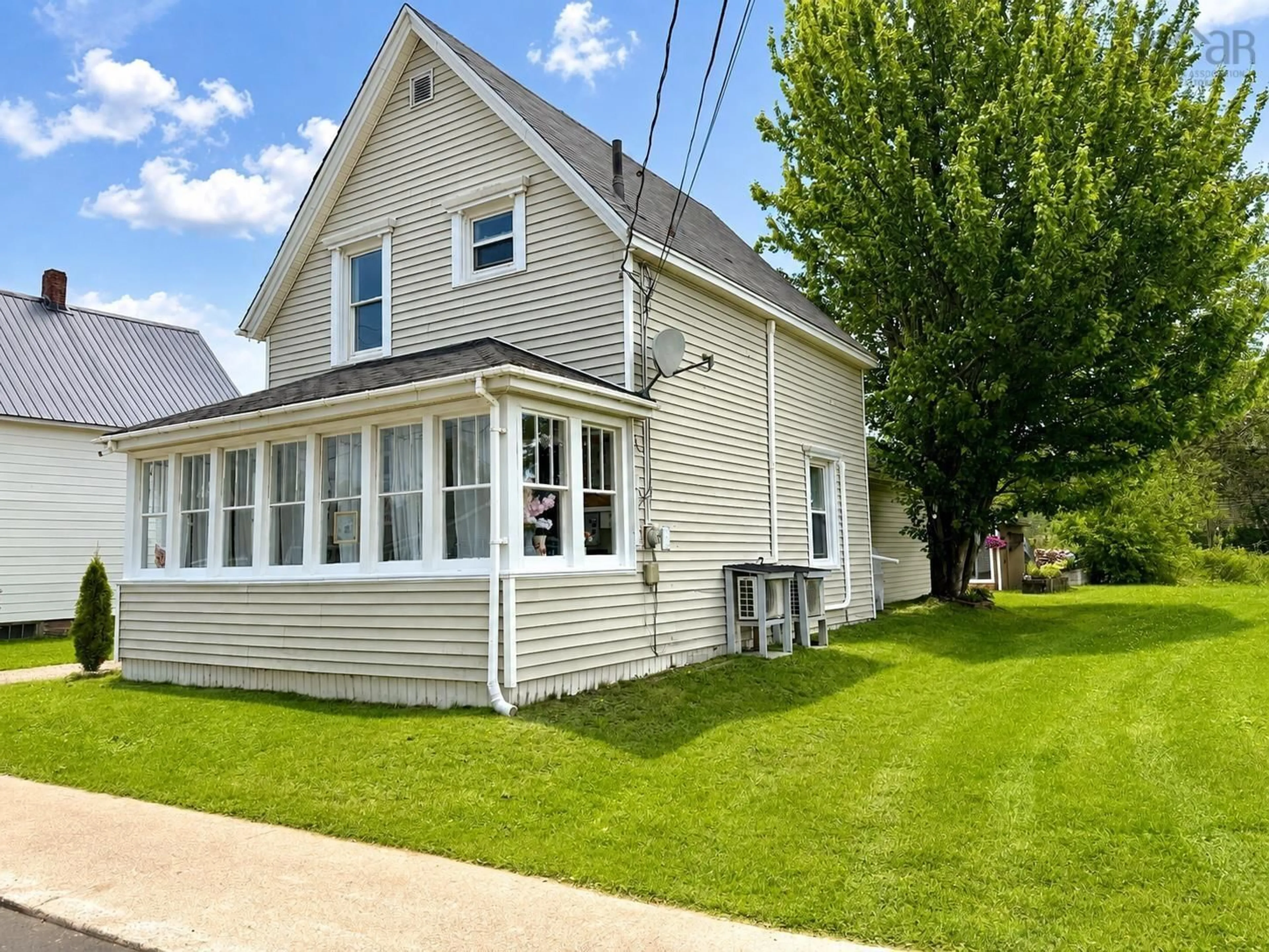 Home with vinyl exterior material, street for 22 Chamberlain St, Amherst Nova Scotia B4H 1J8