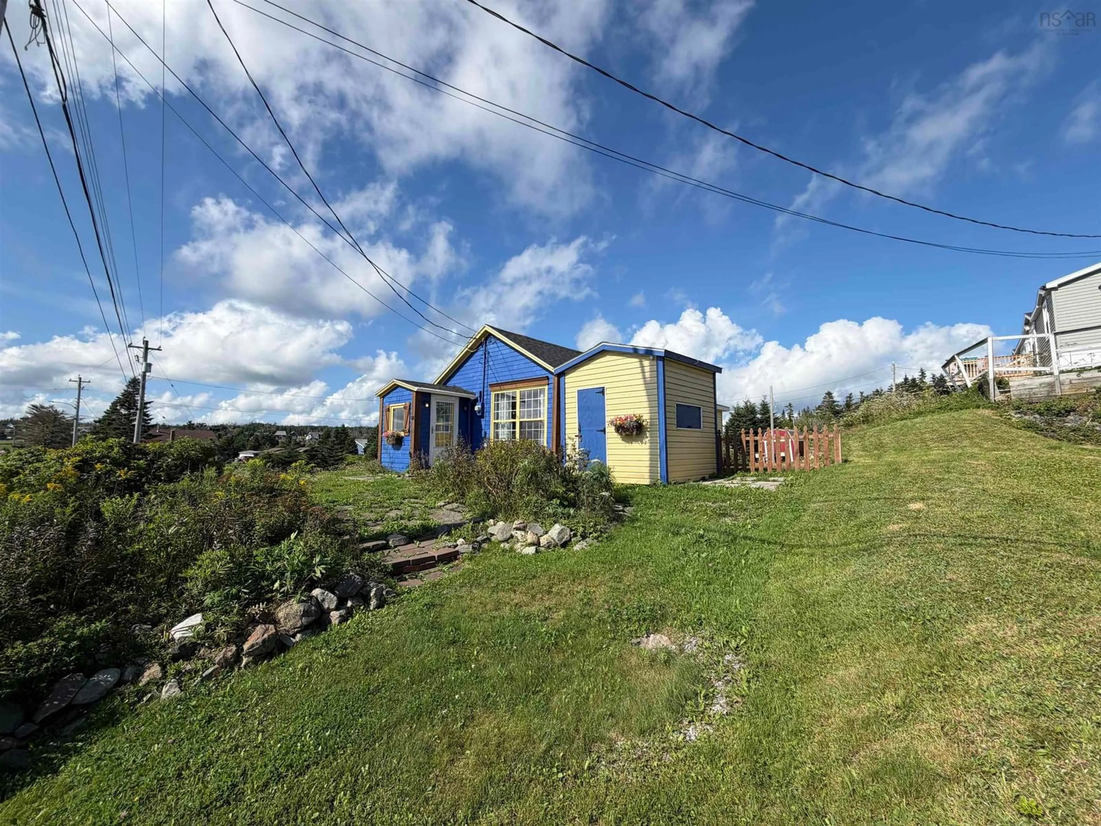 A pic from outside/outdoor area/front of a property/back of a property/a pic from drone, unknown for 101 Havenside Rd, Louisbourg Nova Scotia B1C 1P1