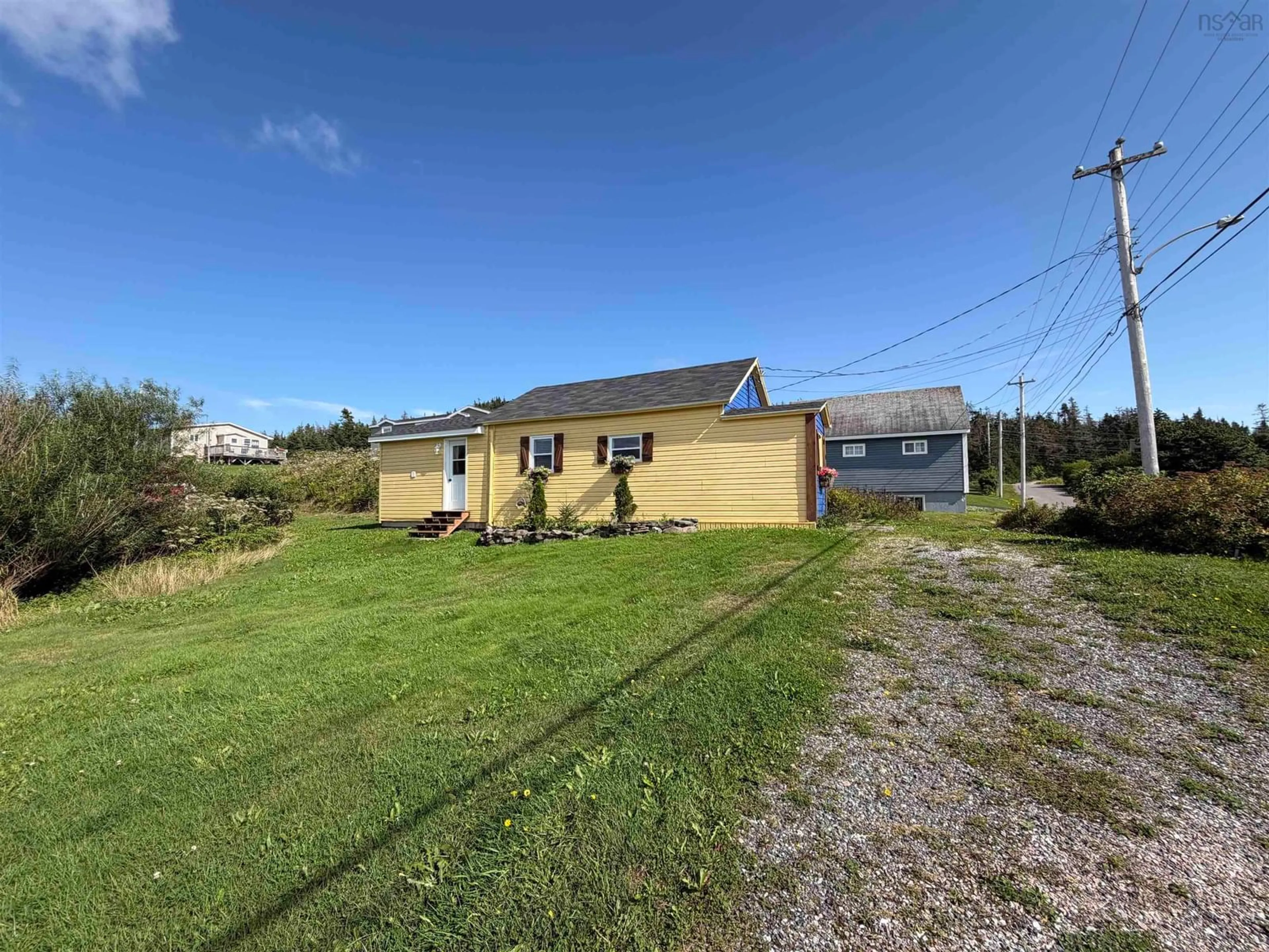 A pic from outside/outdoor area/front of a property/back of a property/a pic from drone, building for 101 Havenside Rd, Louisbourg Nova Scotia B1C 1P1