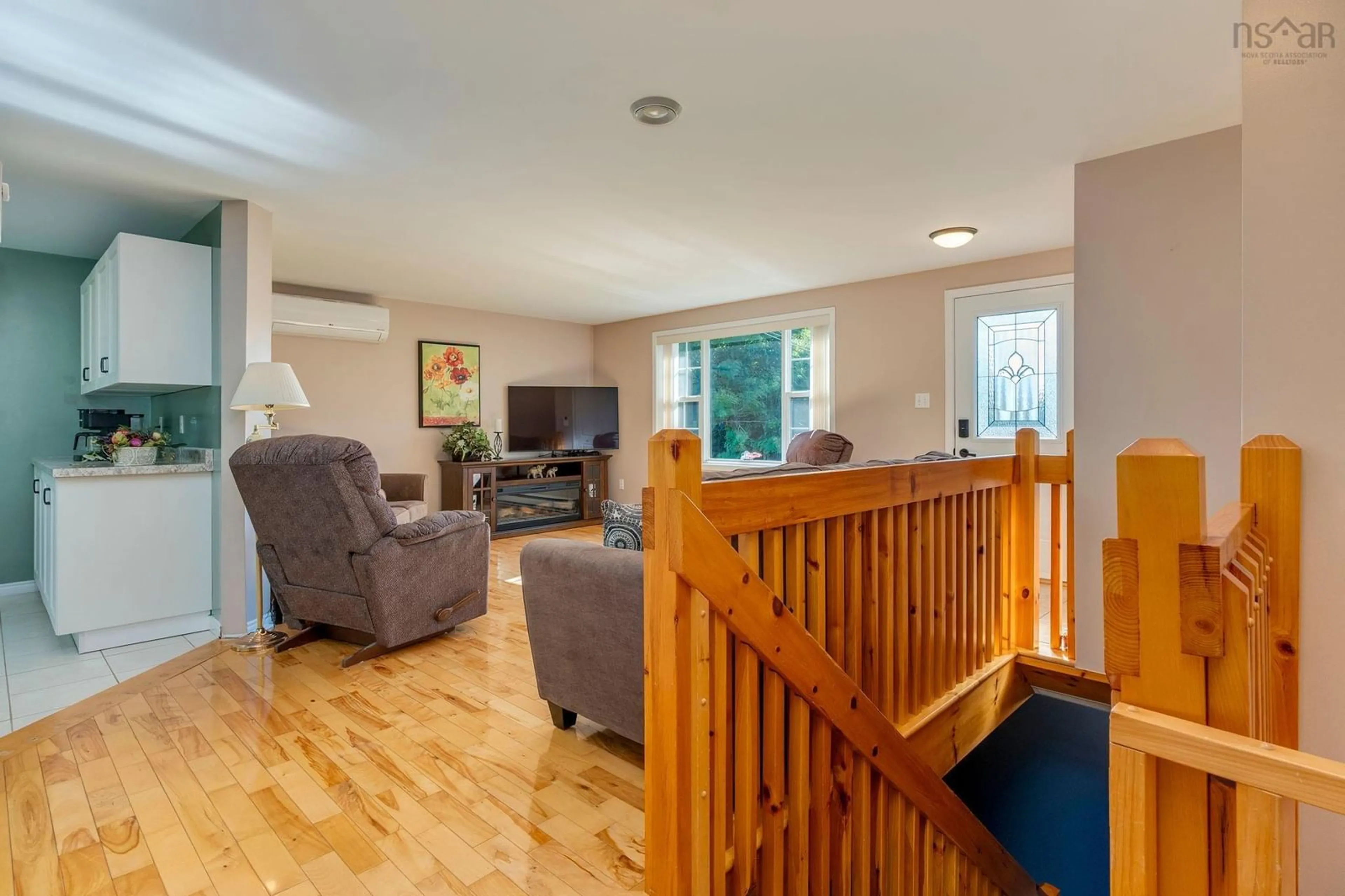 Living room with furniture, wood/laminate floor for 6 Carmichael Crt, Brookside Nova Scotia B3T 1T1