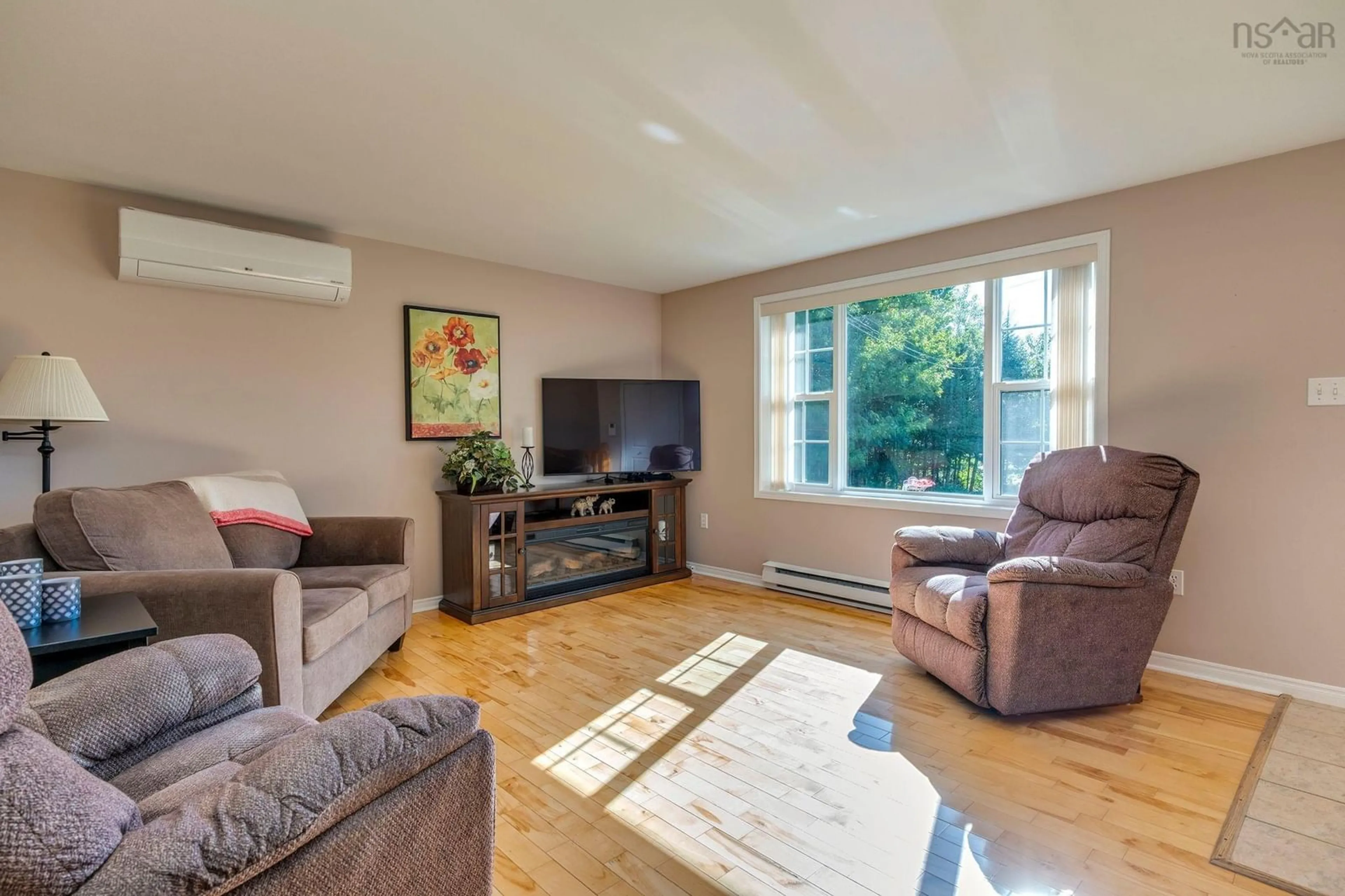 Living room with furniture, wood/laminate floor for 6 Carmichael Crt, Brookside Nova Scotia B3T 1T1