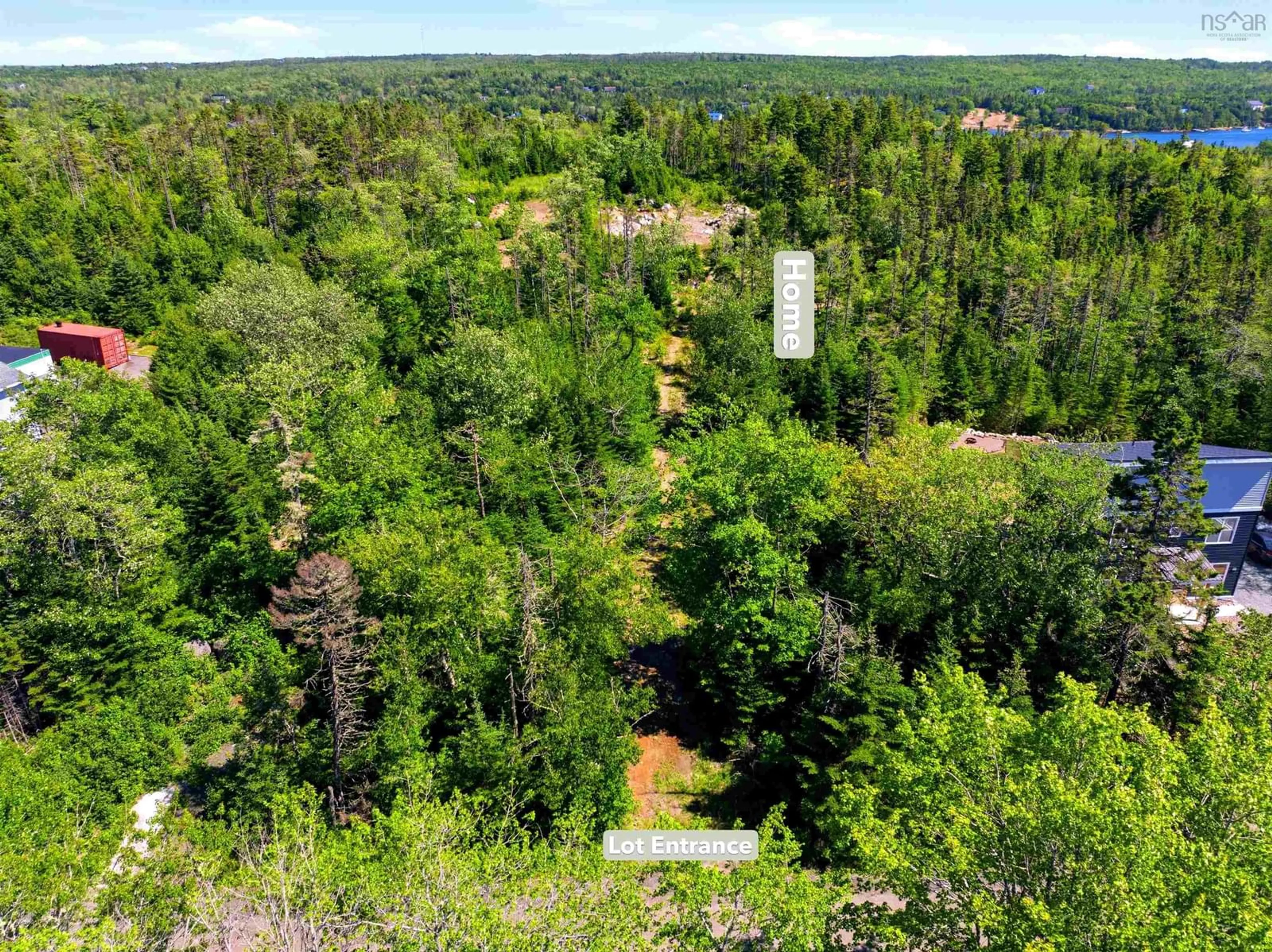 A pic from outside/outdoor area/front of a property/back of a property/a pic from drone, forest/trees view for Lot 105 Burkes Road, Shad Bay Nova Scotia B3T 2B4