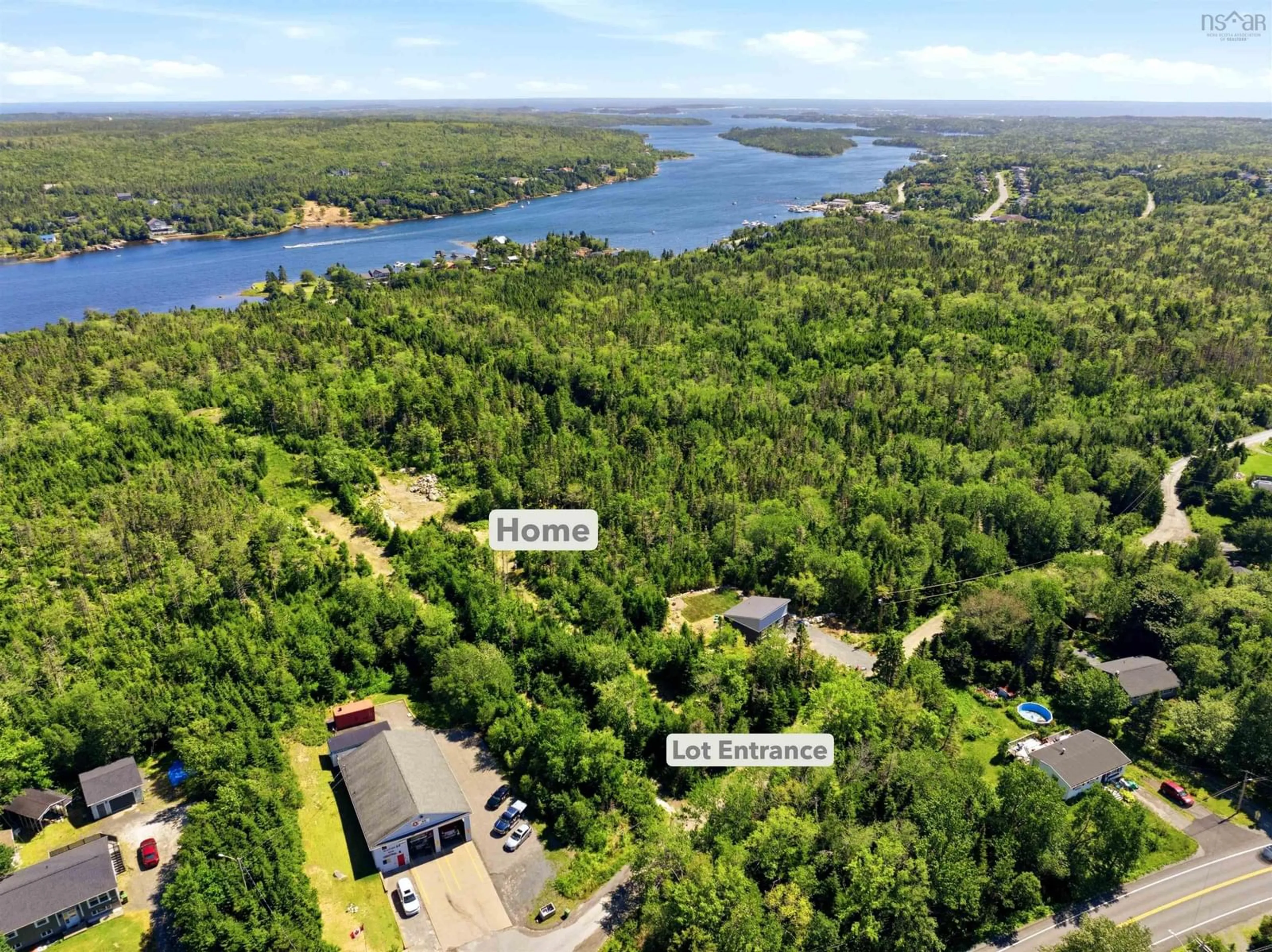 A pic from outside/outdoor area/front of a property/back of a property/a pic from drone, water/lake/river/ocean view for Lot 105 Burkes Road, Shad Bay Nova Scotia B3T 2B4