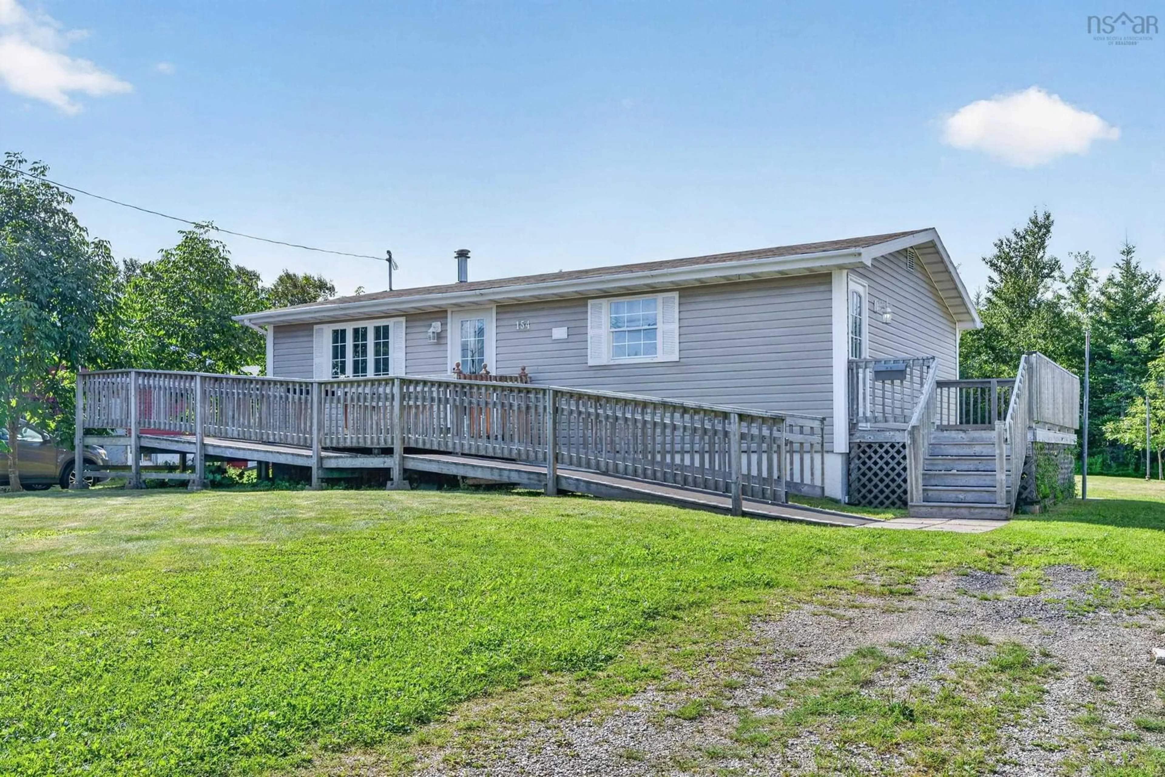 A pic from outside/outdoor area/front of a property/back of a property/a pic from drone, unknown for 154 Daley Road, New Victoria Nova Scotia B1H 4Z8