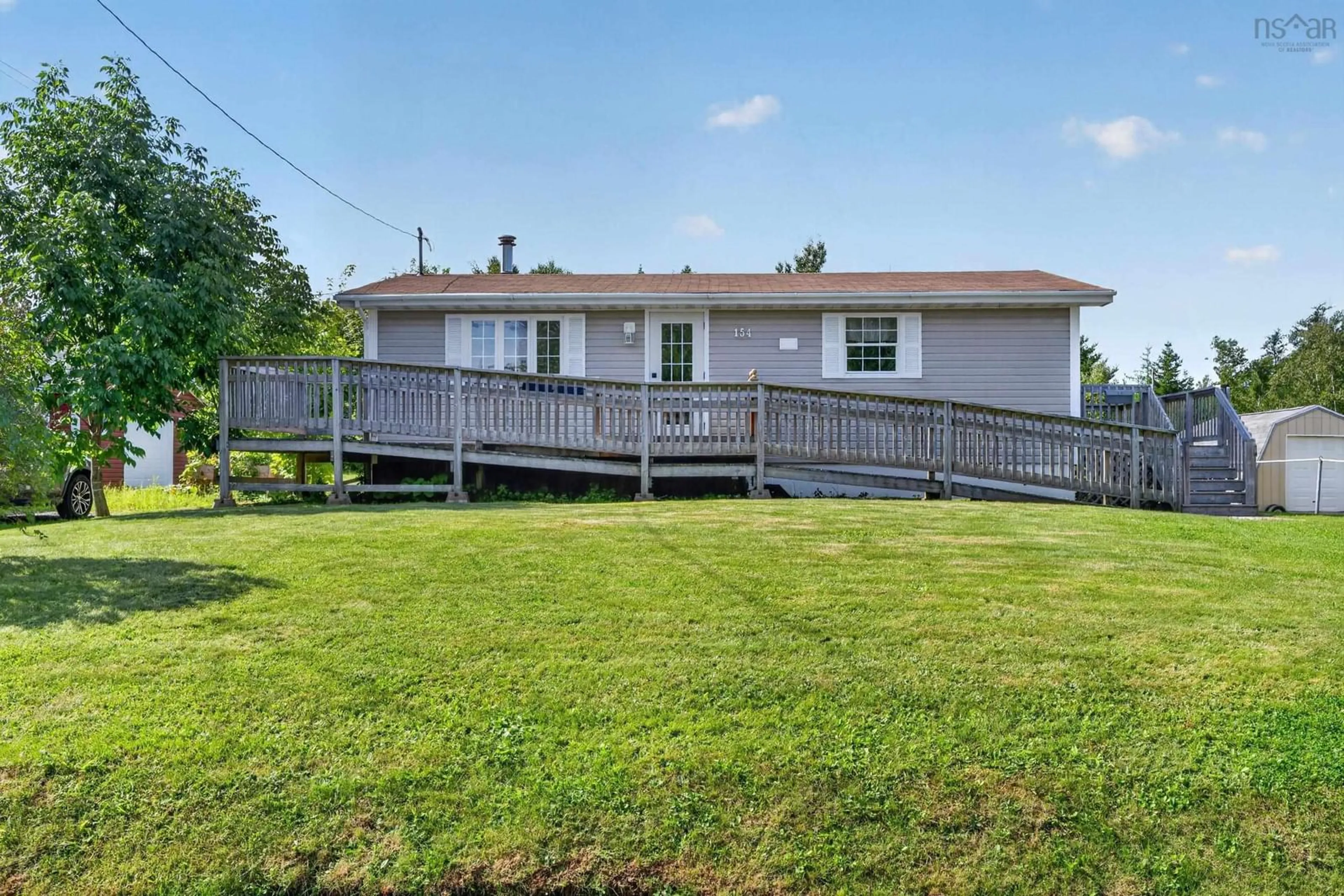 A pic from outside/outdoor area/front of a property/back of a property/a pic from drone, water/lake/river/ocean view for 154 Daley Road, New Victoria Nova Scotia B1H 4Z8