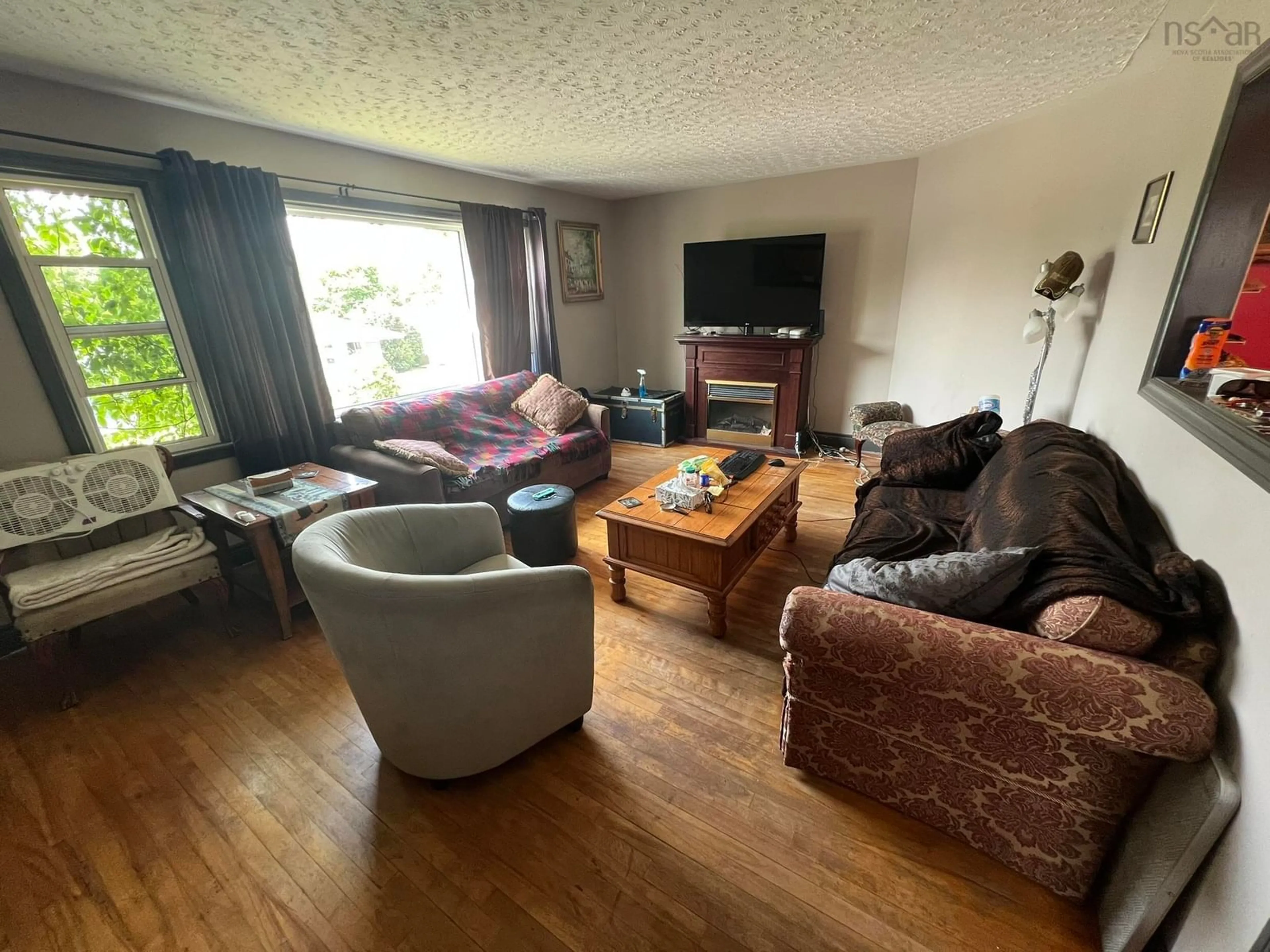 Living room with furniture, unknown for 24 Charles St, Dartmouth Nova Scotia B3A 3W6