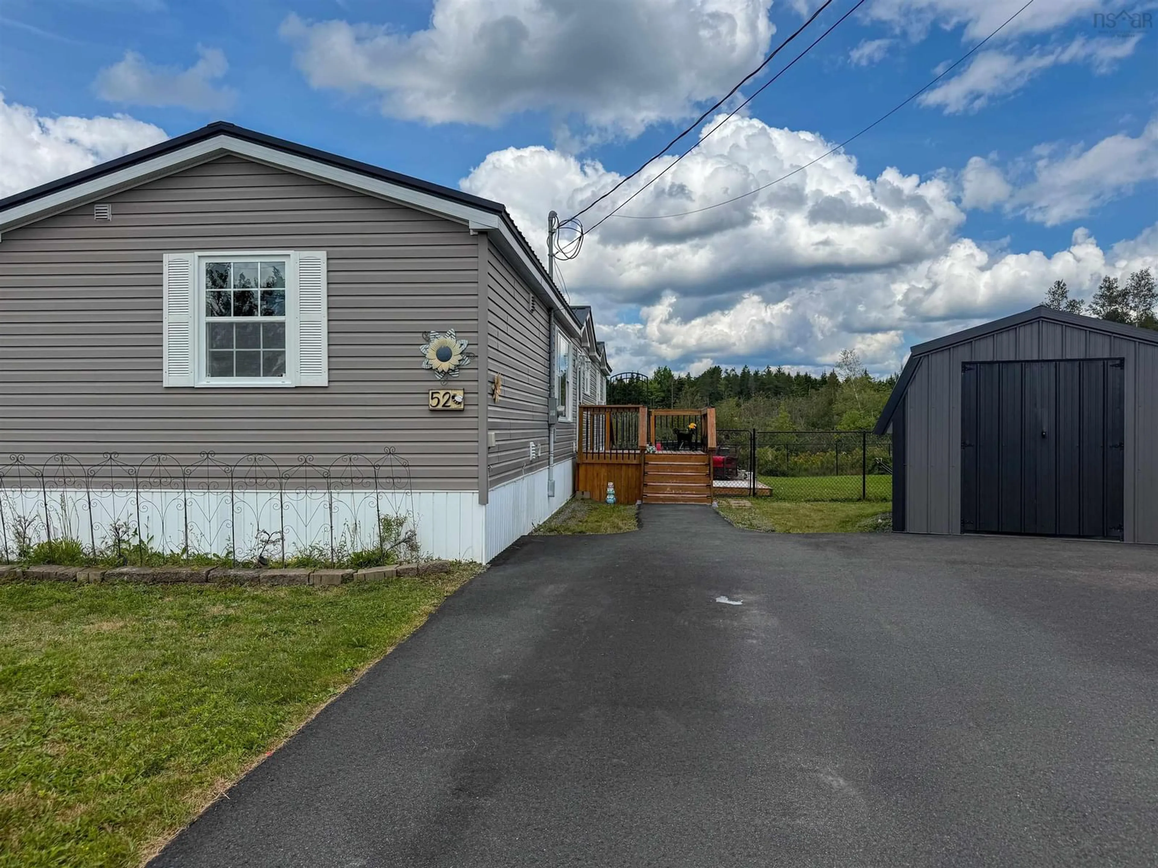 A pic from outside/outdoor area/front of a property/back of a property/a pic from drone, street for 52 Empire Loop, Truro Nova Scotia B2N 7B5