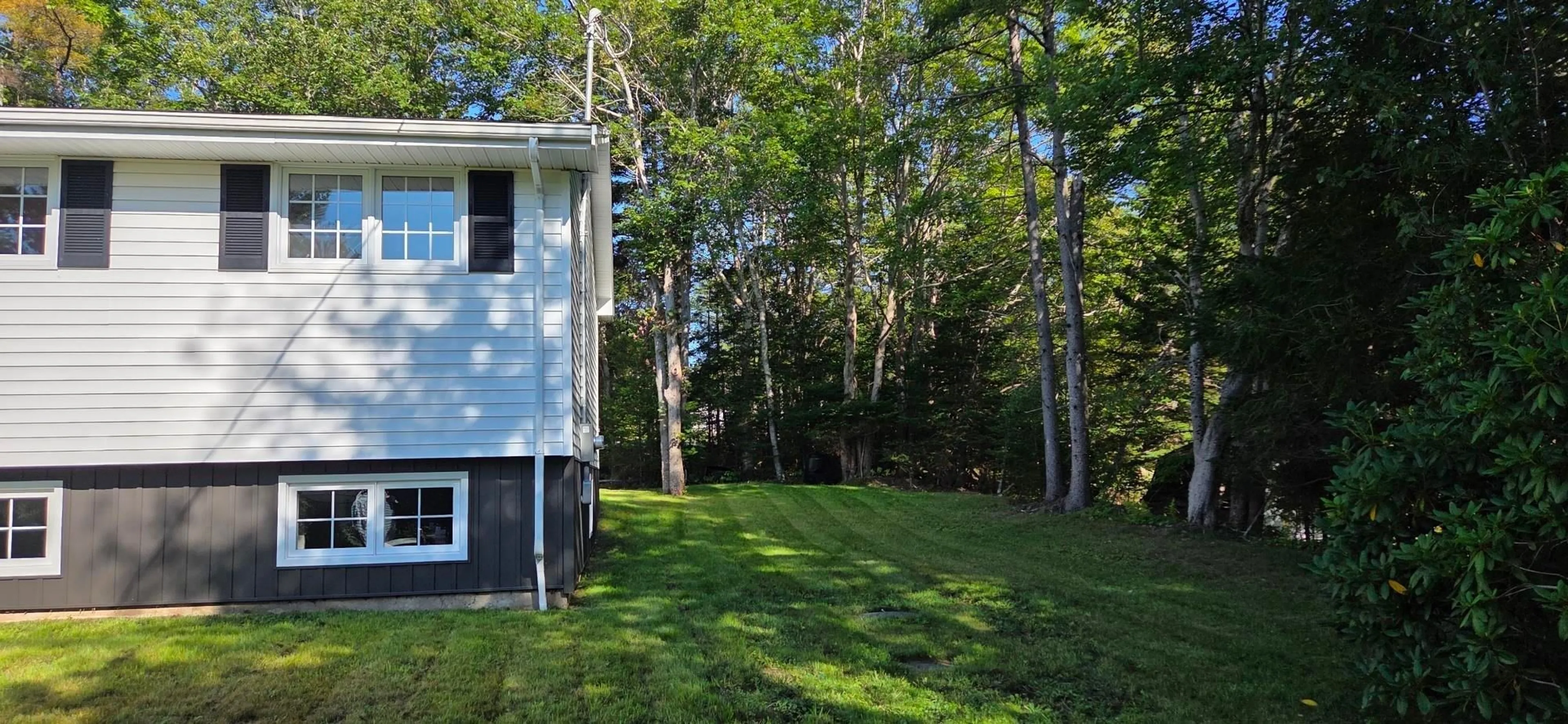 Home with vinyl exterior material, forest/trees view for 85 Pinetree Cres, Hammonds Plains Nova Scotia B3Z 1K4