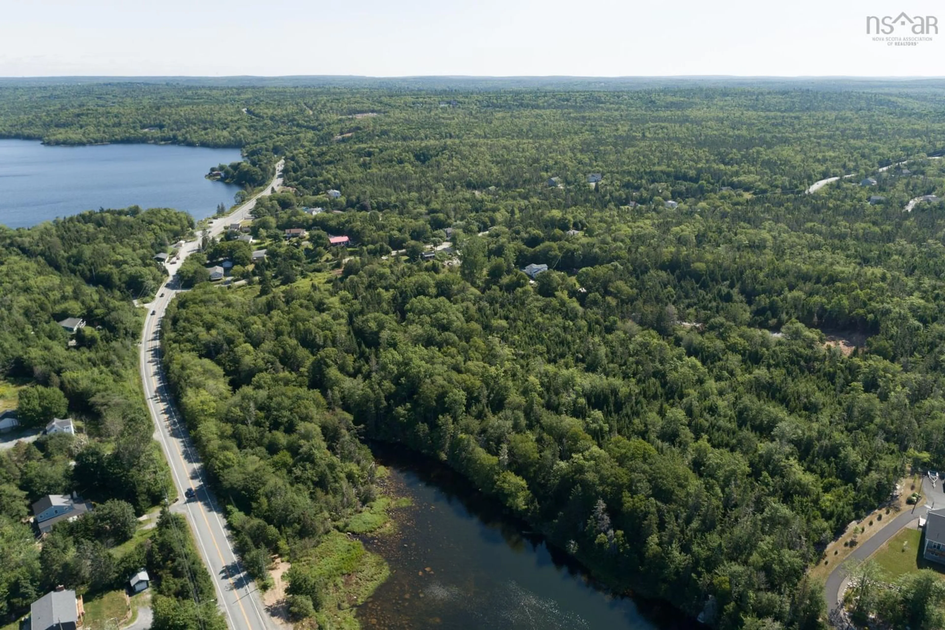 A pic from outside/outdoor area/front of a property/back of a property/a pic from drone, water/lake/river/ocean view for 1 All Hallows Dr #Lot, Whites Lake Nova Scotia B3T 1V3
