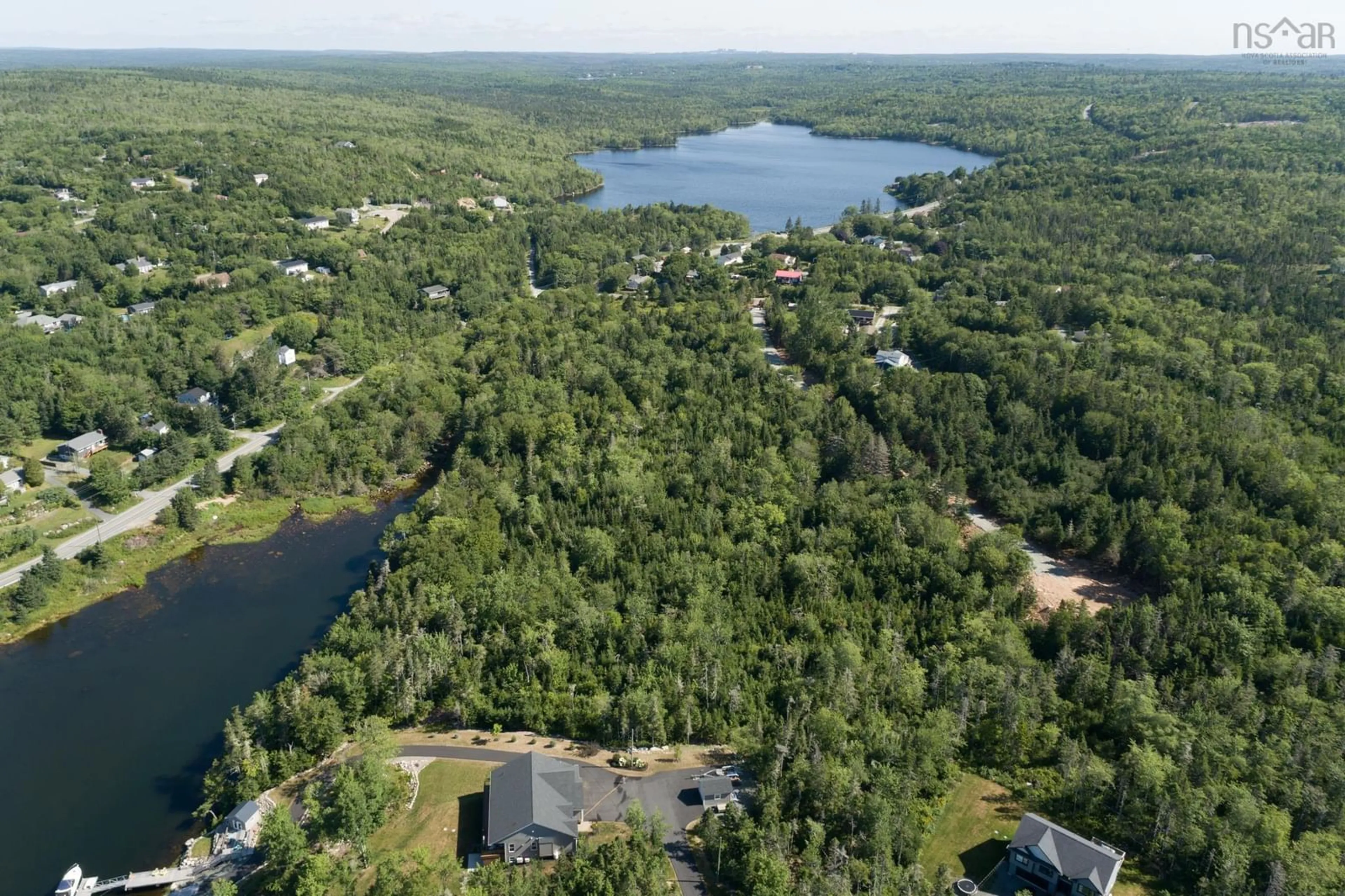 A pic from outside/outdoor area/front of a property/back of a property/a pic from drone, water/lake/river/ocean view for 1 All Hallows Dr #Lot, Whites Lake Nova Scotia B3T 1V3