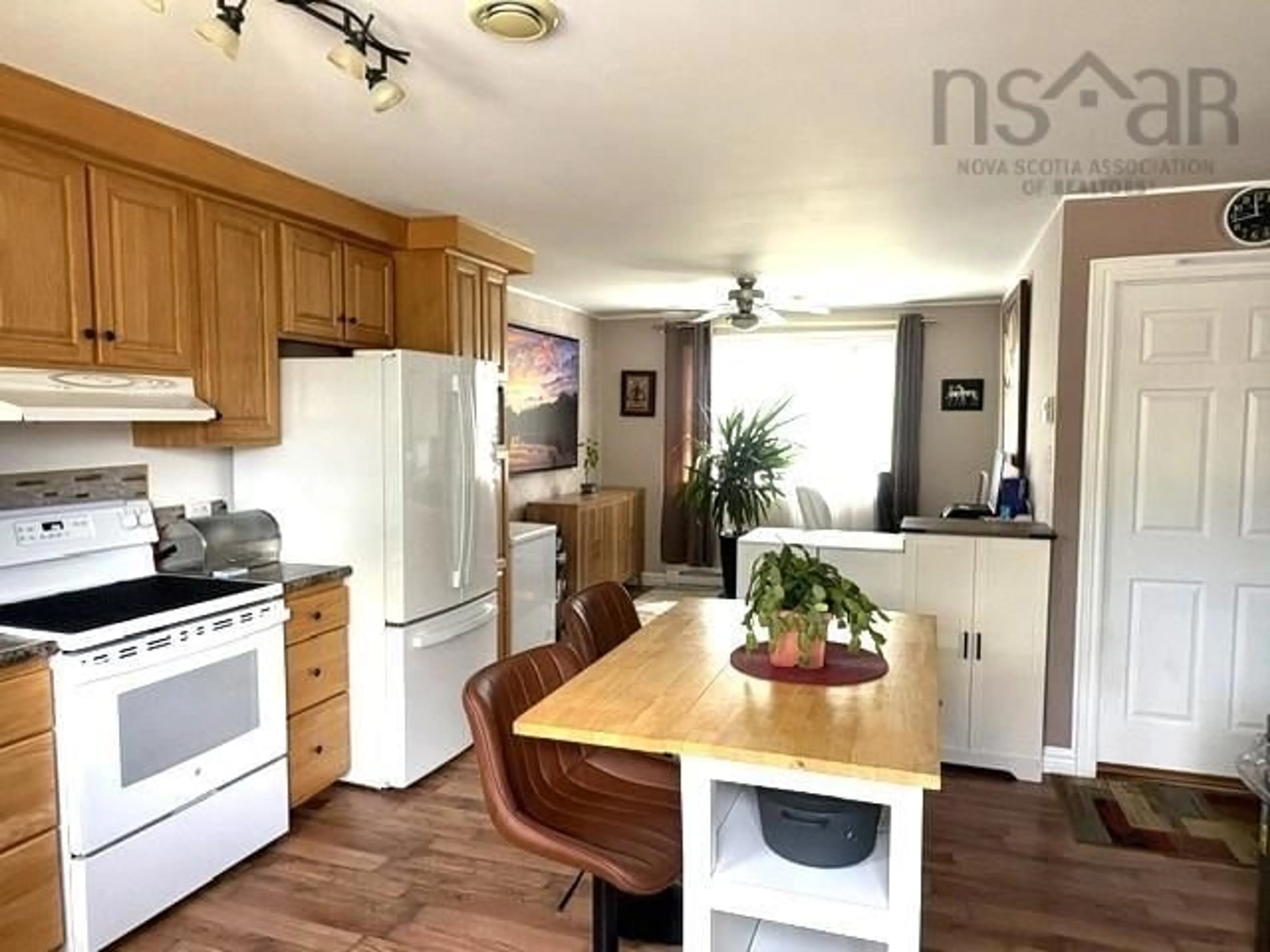 Open concept kitchen, wood/laminate floor for 205 Clements St, Shelburne Nova Scotia B0T 1W0