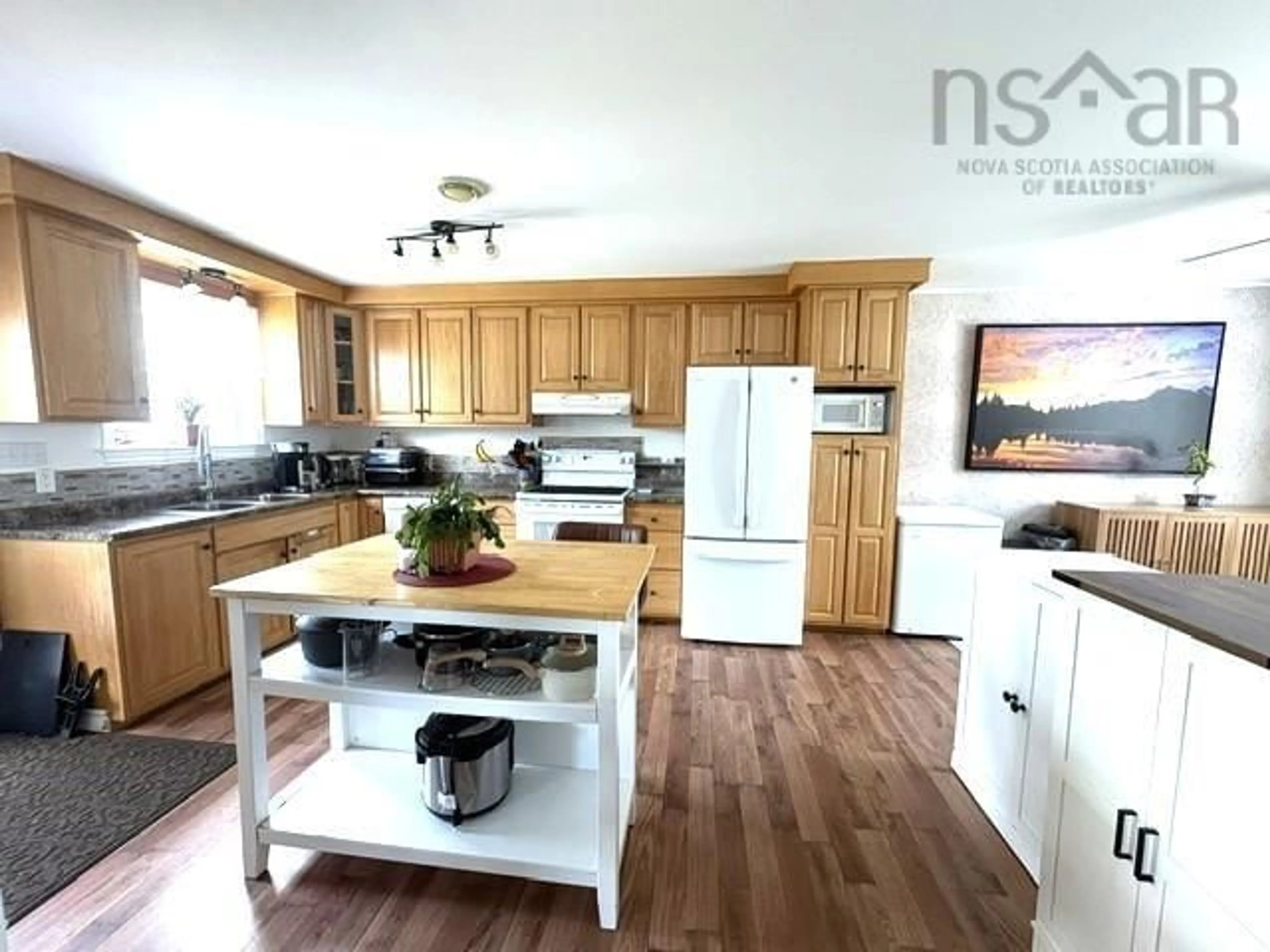 Open concept kitchen, wood/laminate floor for 205 Clements St, Shelburne Nova Scotia B0T 1W0