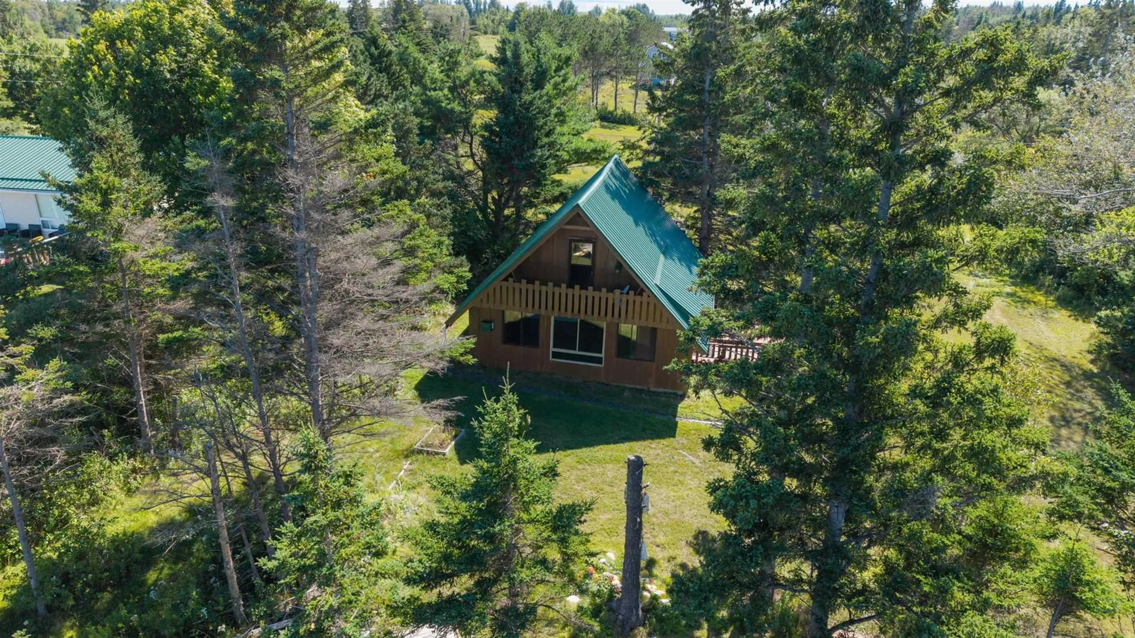 A pic from outside/outdoor area/front of a property/back of a property/a pic from drone, forest/trees view for 55 Joyce Mackinnon Lane, Seafoam Nova Scotia B0K 1N0