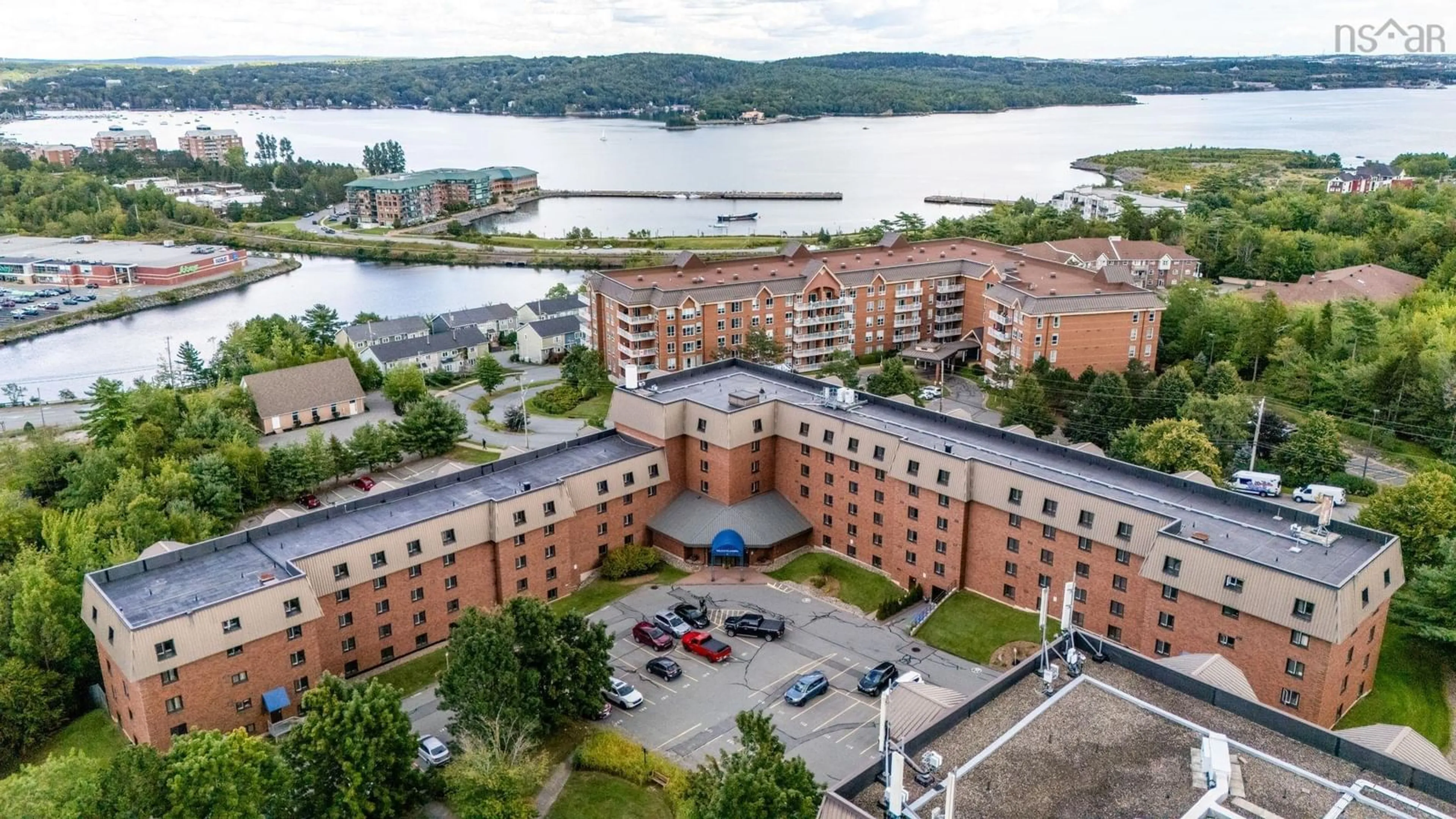 A pic from outside/outdoor area/front of a property/back of a property/a pic from drone, water/lake/river/ocean view for 61 Nelsons Landing Blvd #205, Bedford Nova Scotia B4A 3X3