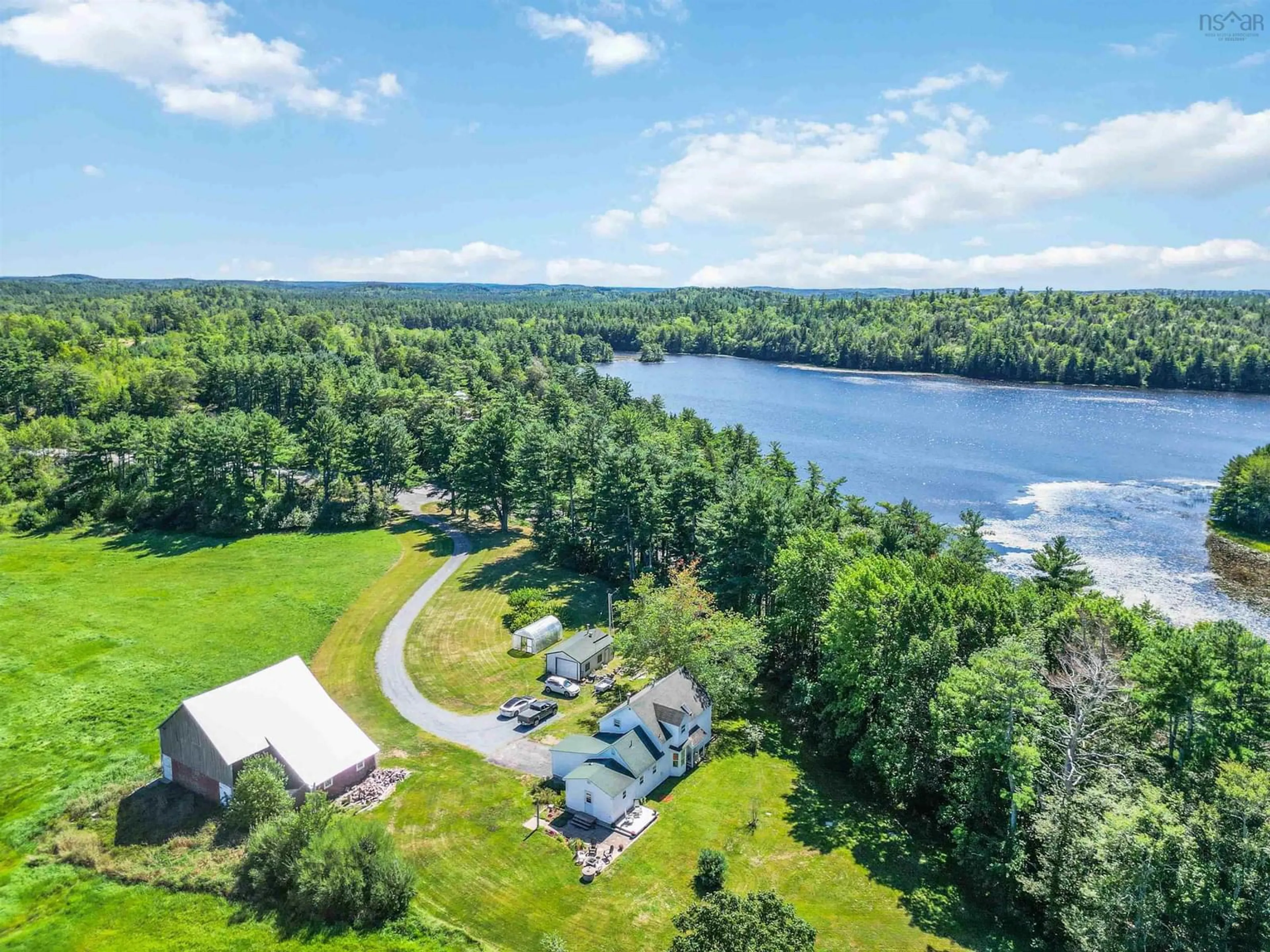 A pic from outside/outdoor area/front of a property/back of a property/a pic from drone, water/lake/river/ocean view for 9414 Highway 8, Caledonia Nova Scotia B0T 1B0