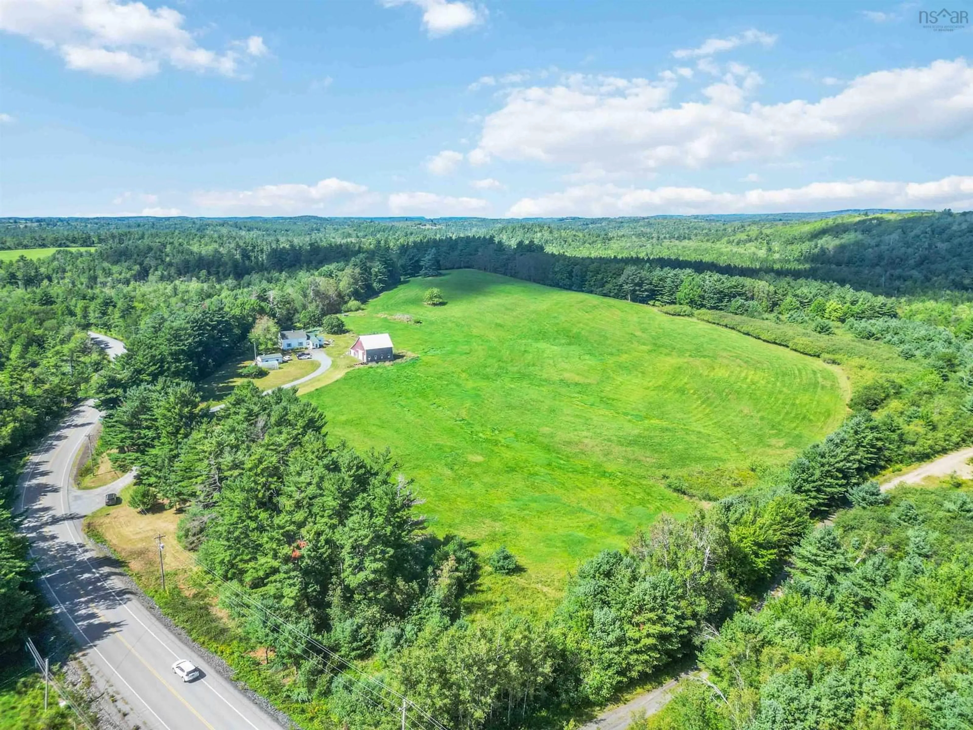 A pic from outside/outdoor area/front of a property/back of a property/a pic from drone, forest/trees view for 9414 Highway 8, Caledonia Nova Scotia B0T 1B0