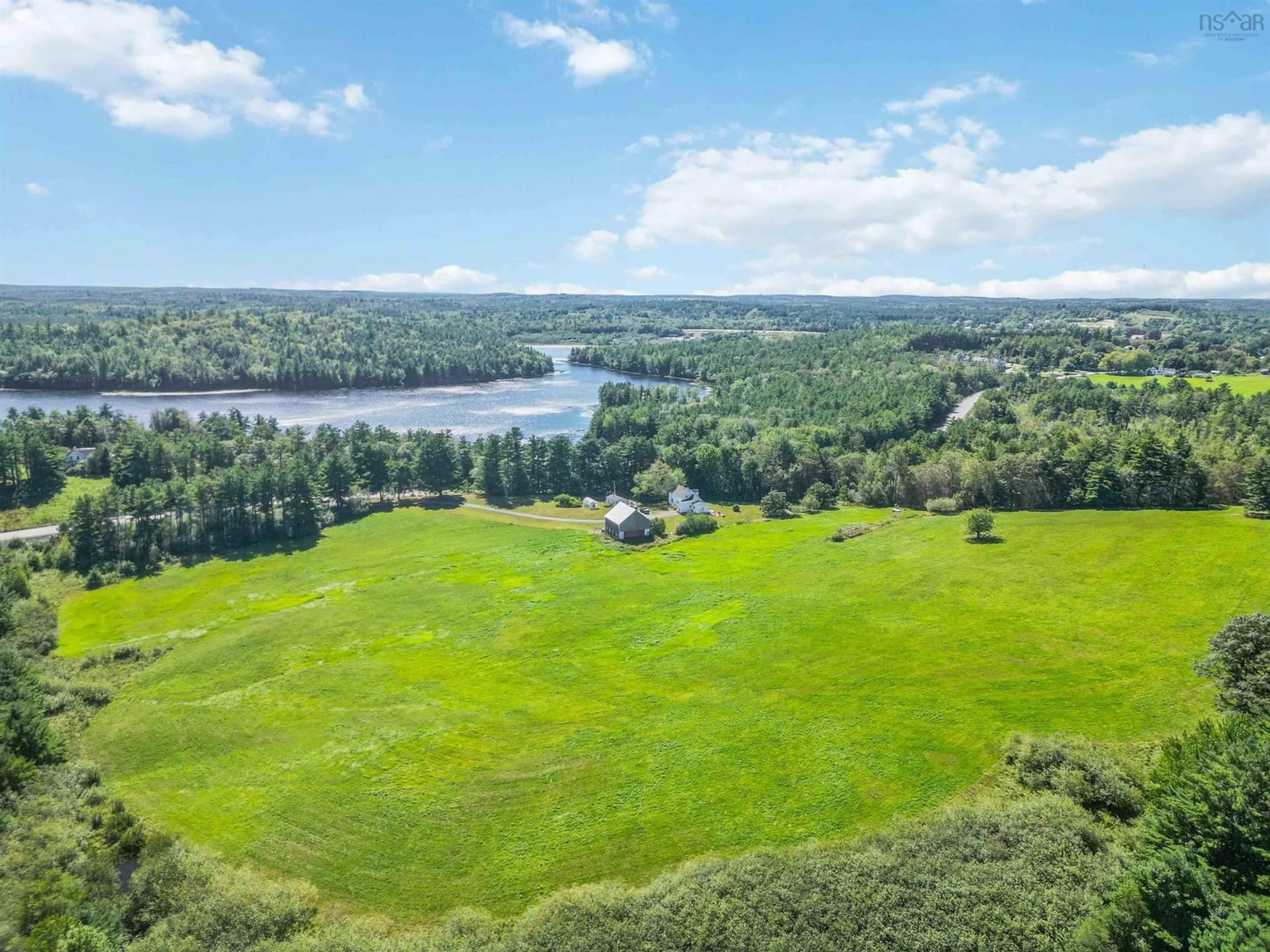 A pic from outside/outdoor area/front of a property/back of a property/a pic from drone, water/lake/river/ocean view for 9414 Highway 8, Caledonia Nova Scotia B0T 1B0