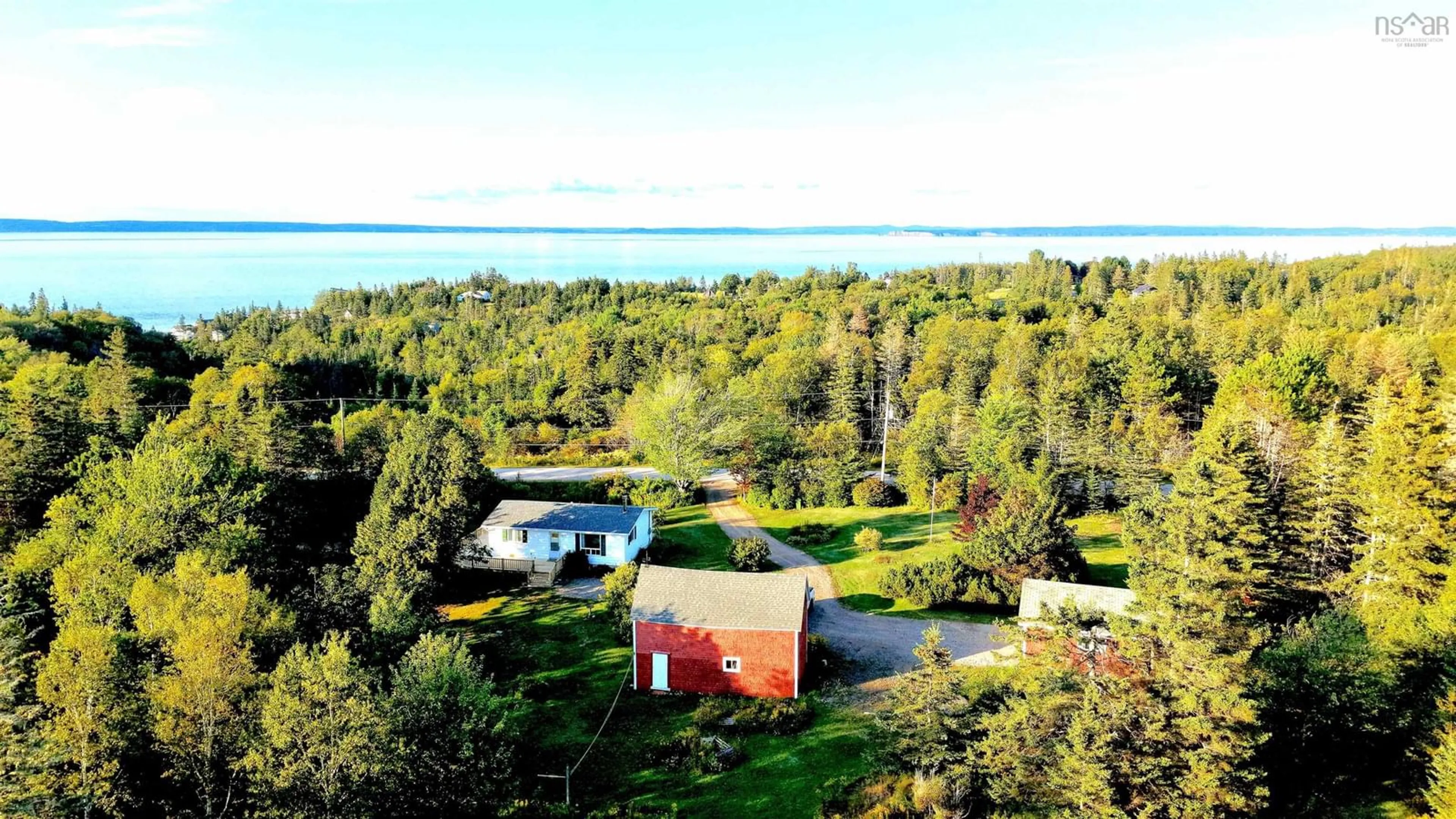 A pic from outside/outdoor area/front of a property/back of a property/a pic from drone, water/lake/river/ocean view for 1005 West Halls Harbour Rd, Halls Harbour Nova Scotia B0P 1J0
