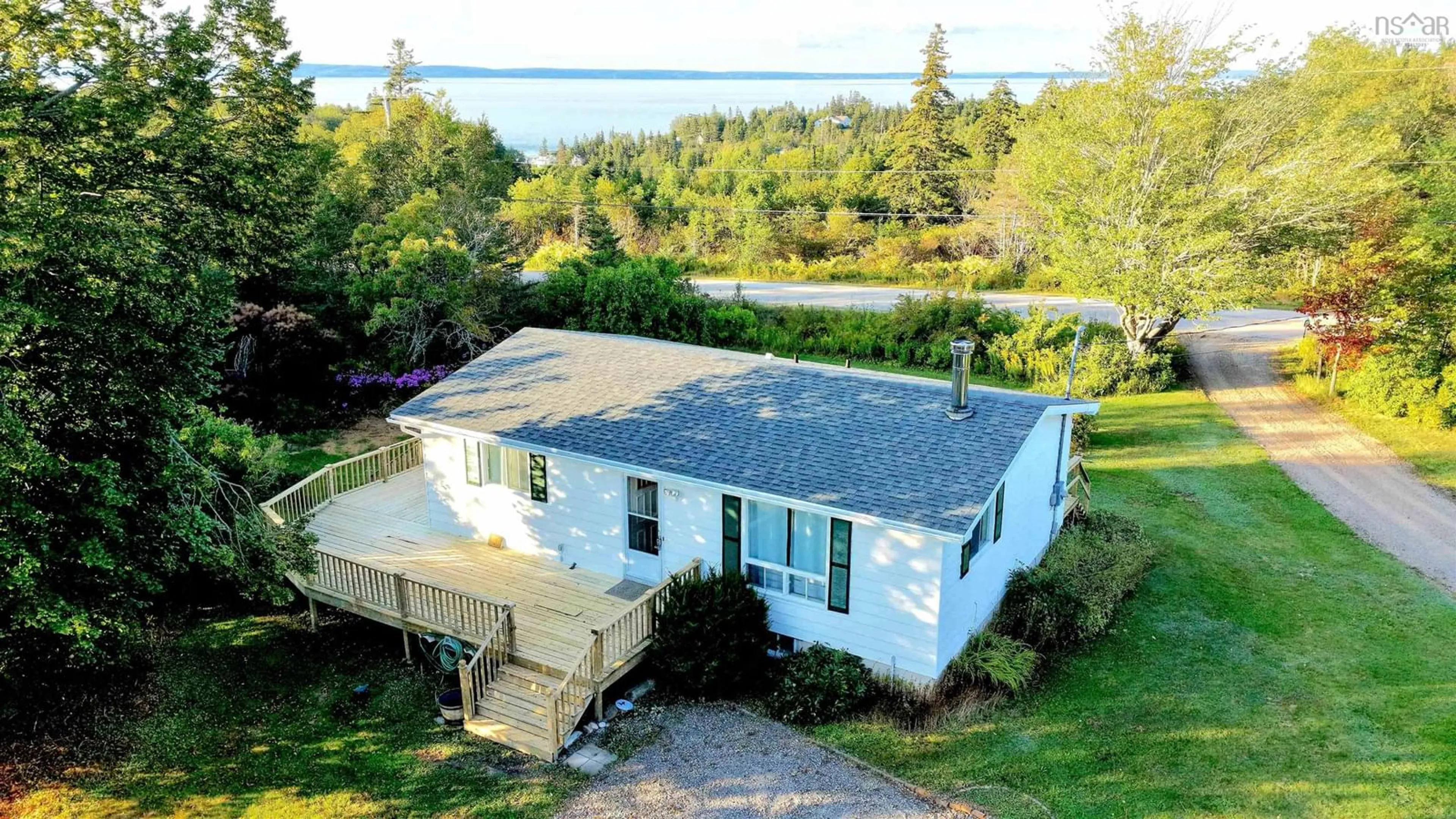 A pic from outside/outdoor area/front of a property/back of a property/a pic from drone, water/lake/river/ocean view for 1005 West Halls Harbour Rd, Halls Harbour Nova Scotia B0P 1J0