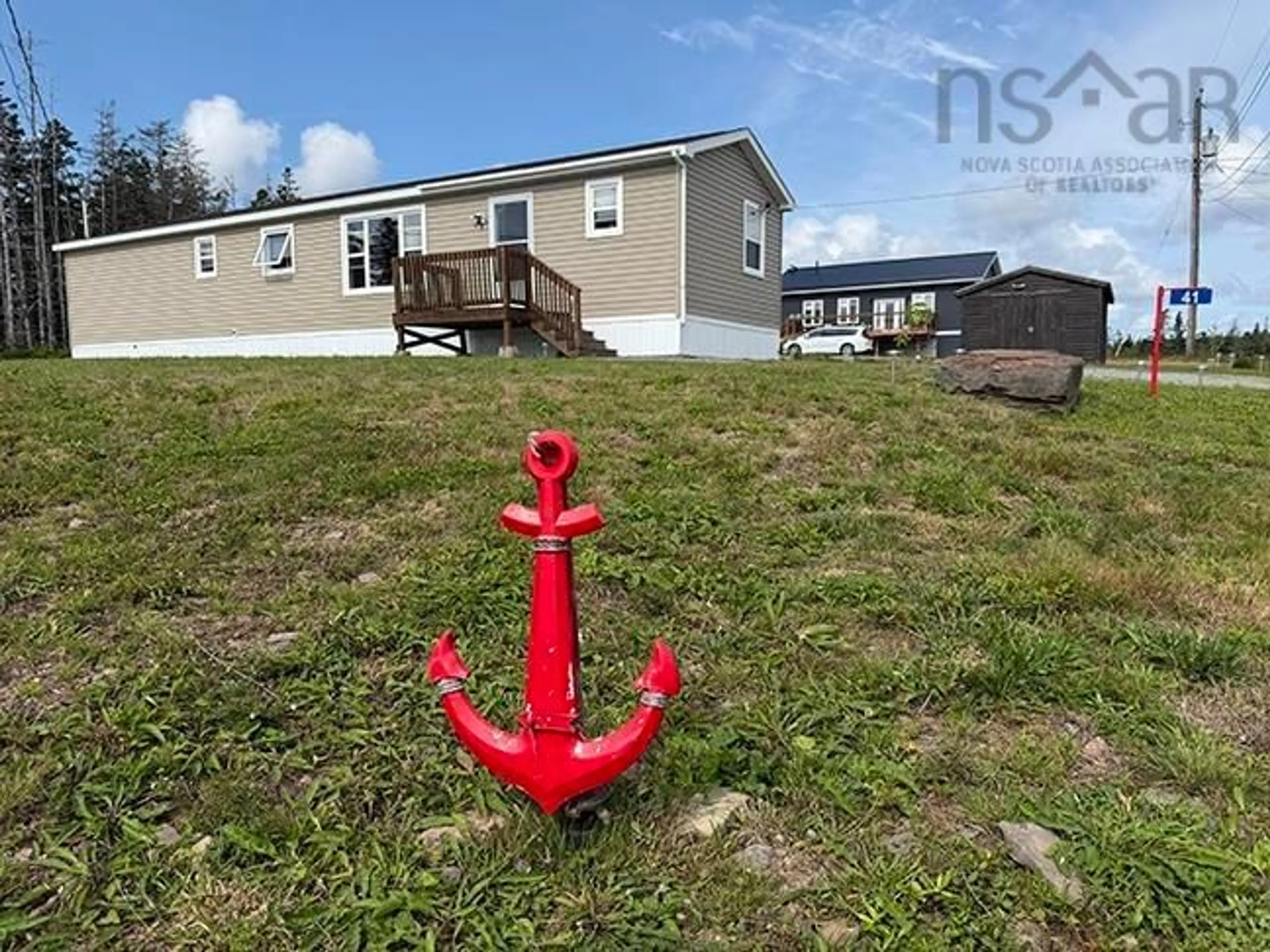 A pic from outside/outdoor area/front of a property/back of a property/a pic from drone, water/lake/river/ocean view for 41 Northside Dr #Lot #8, St. Peter's Nova Scotia B0E 3B0