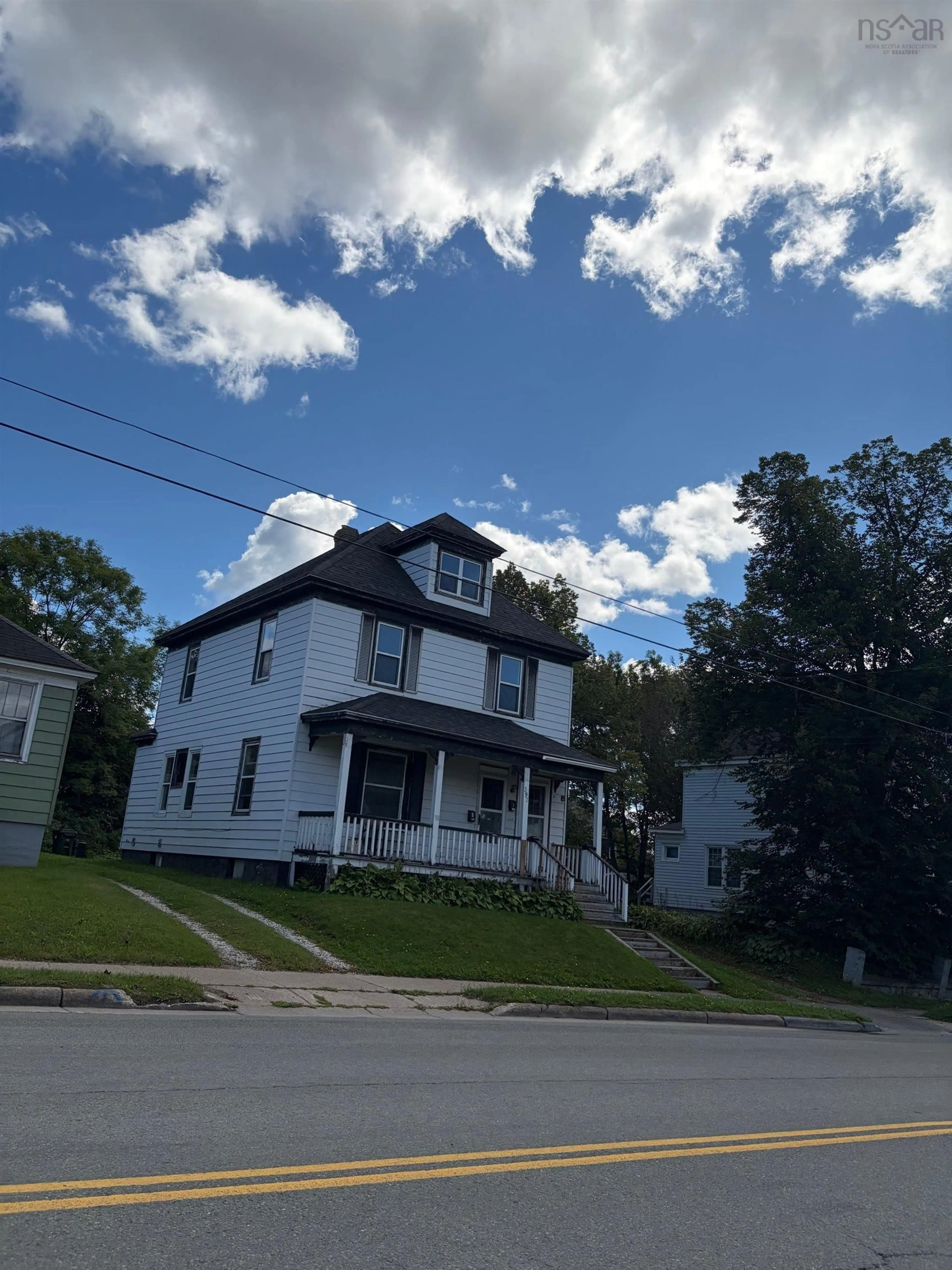 A pic from outside/outdoor area/front of a property/back of a property/a pic from drone, street for 392 Townsend St, Sydney Nova Scotia B1P 5G4