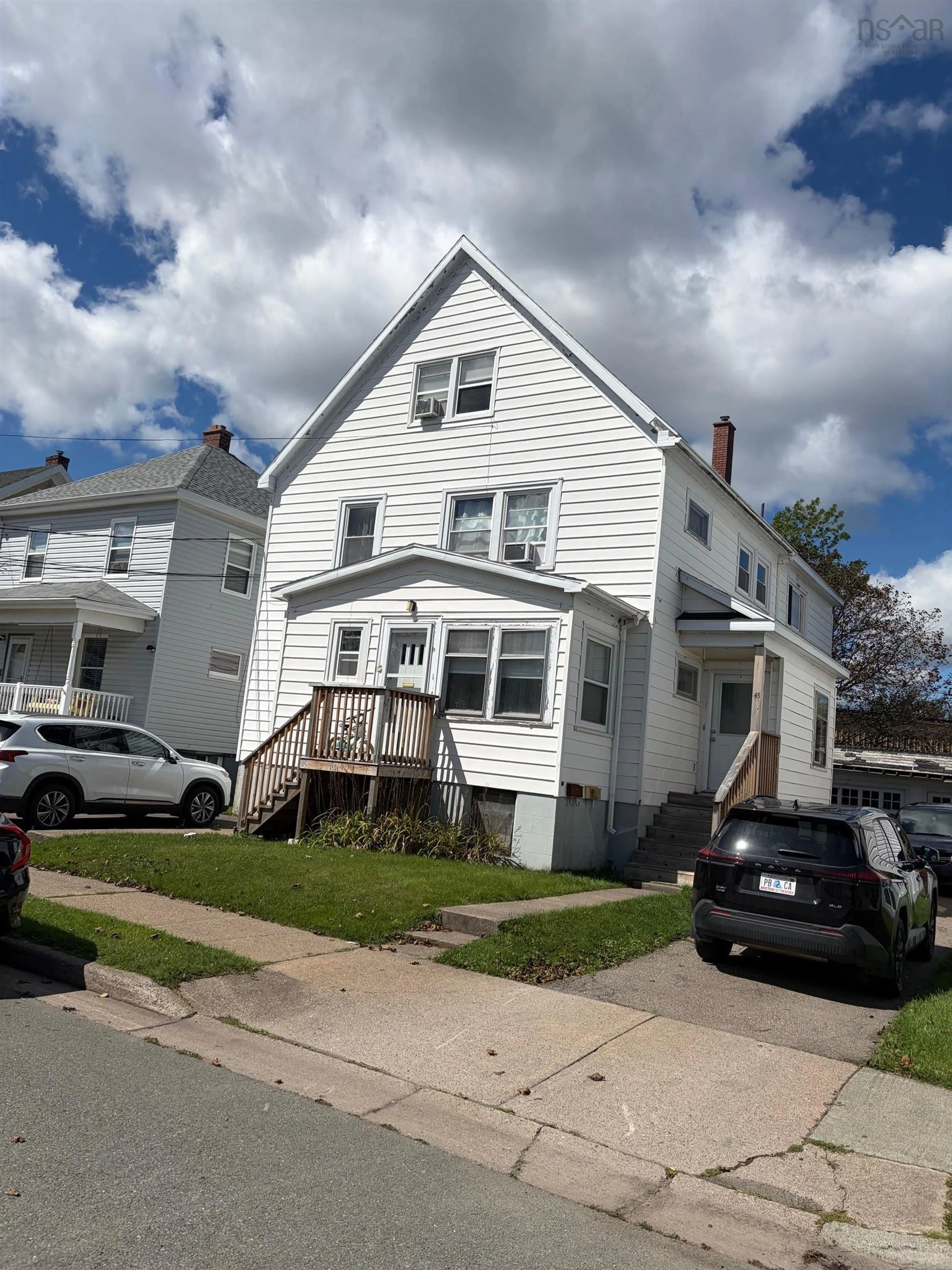 Home with vinyl exterior material, street for 41 Trinity Ave, Sydney Nova Scotia B1P 4Z4