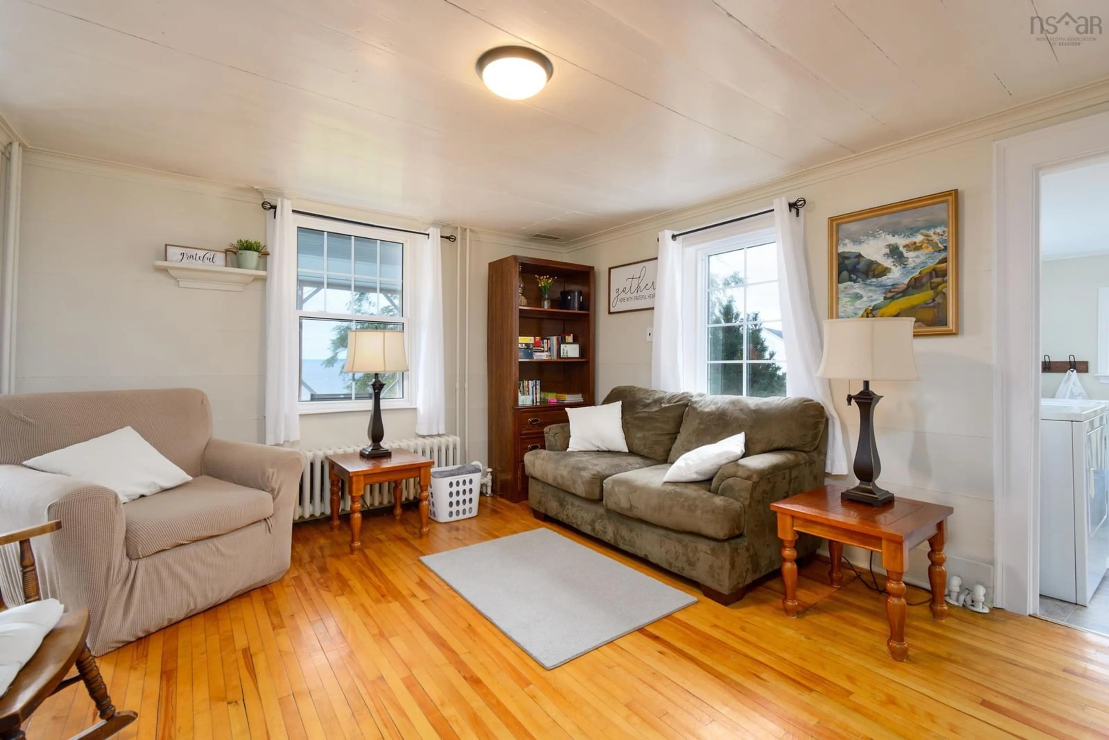 Living room with furniture, wood/laminate floor for 15398 Highway 4, Johnstown Nova Scotia B0E 3B0