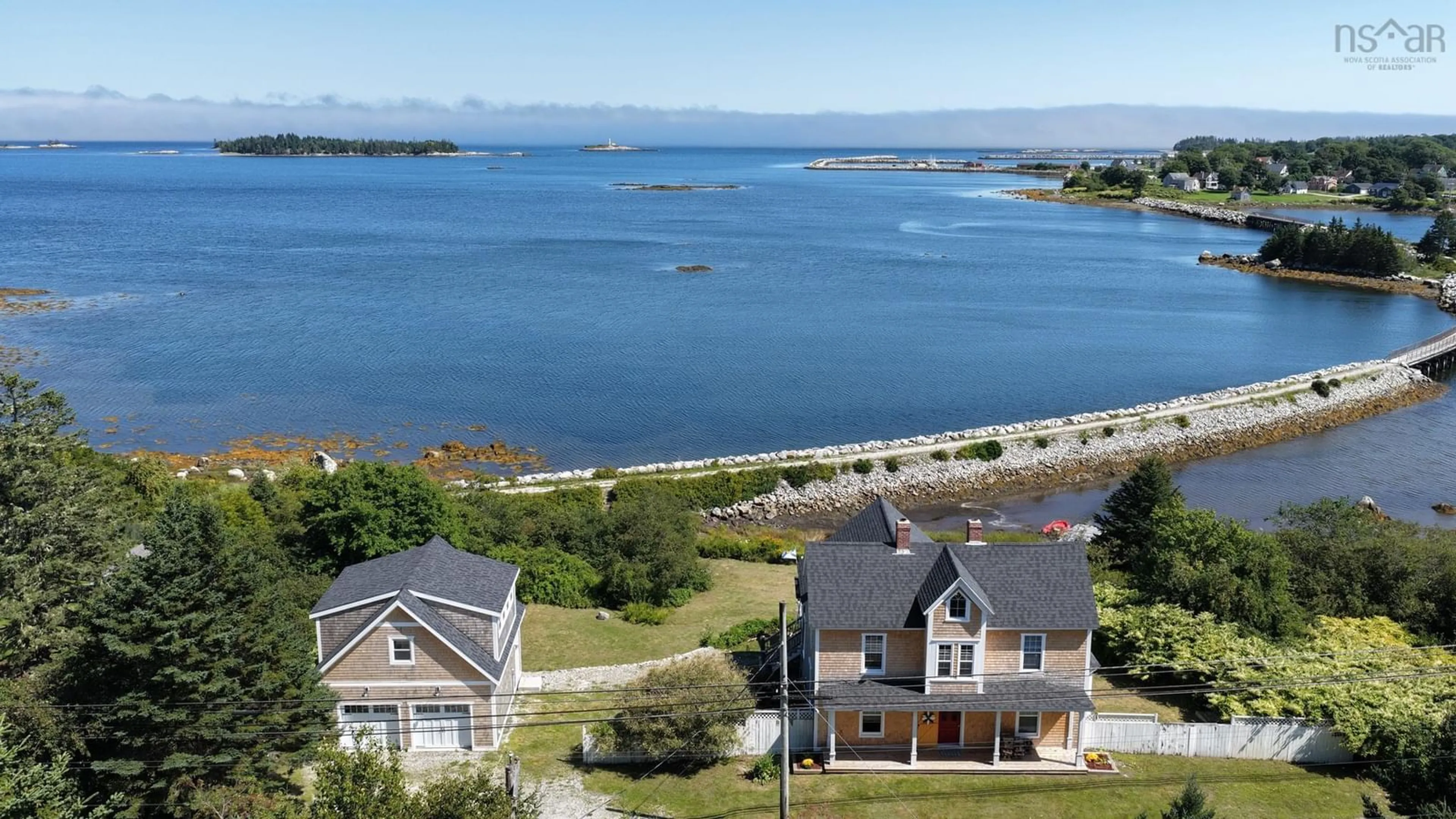 A pic from outside/outdoor area/front of a property/back of a property/a pic from drone, water/lake/river/ocean view for 220 Brighton Rd, Lockeport Nova Scotia B0T 1L0