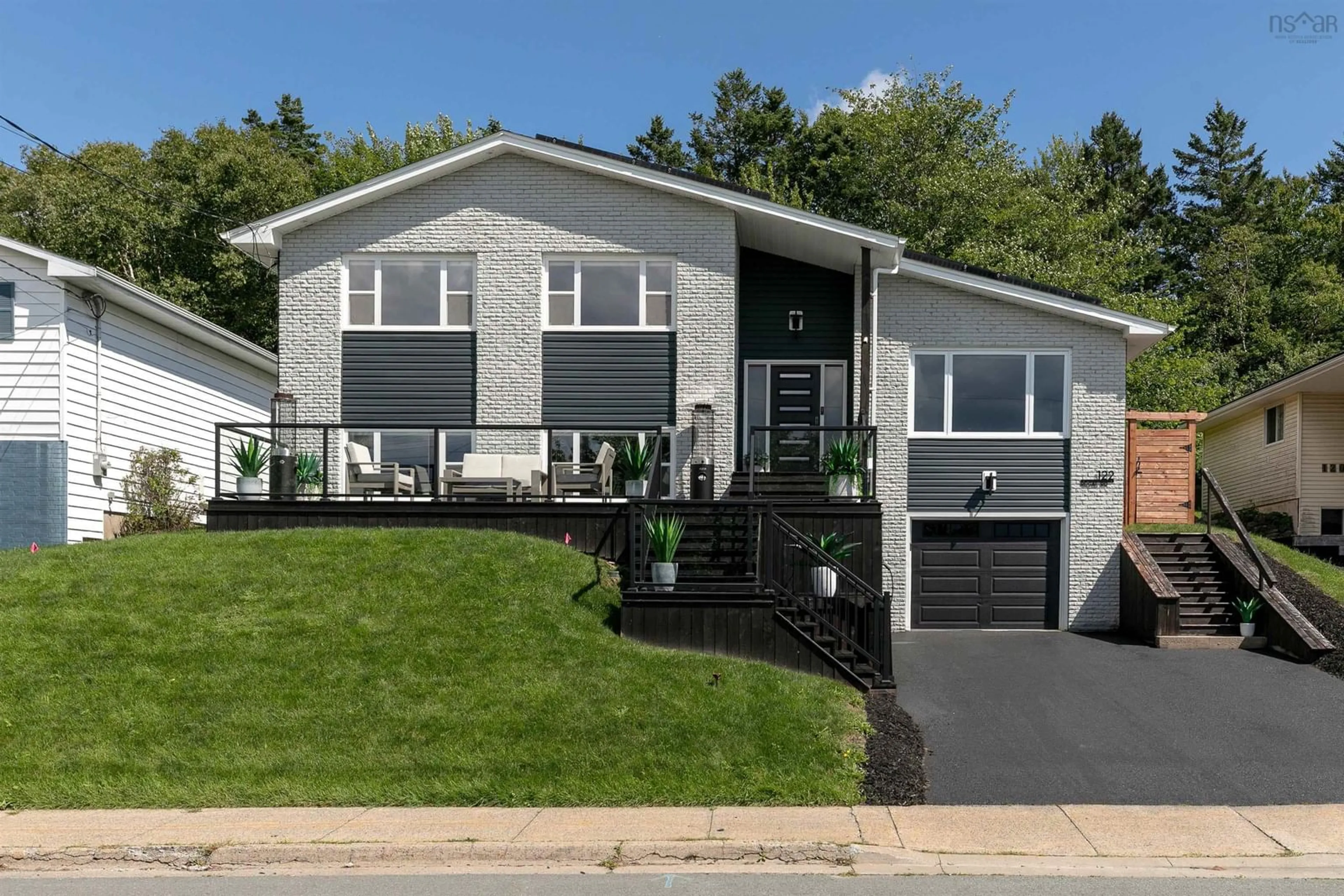 Home with vinyl exterior material, street for 122 Regal Rd, Dartmouth Nova Scotia B2W 4H8