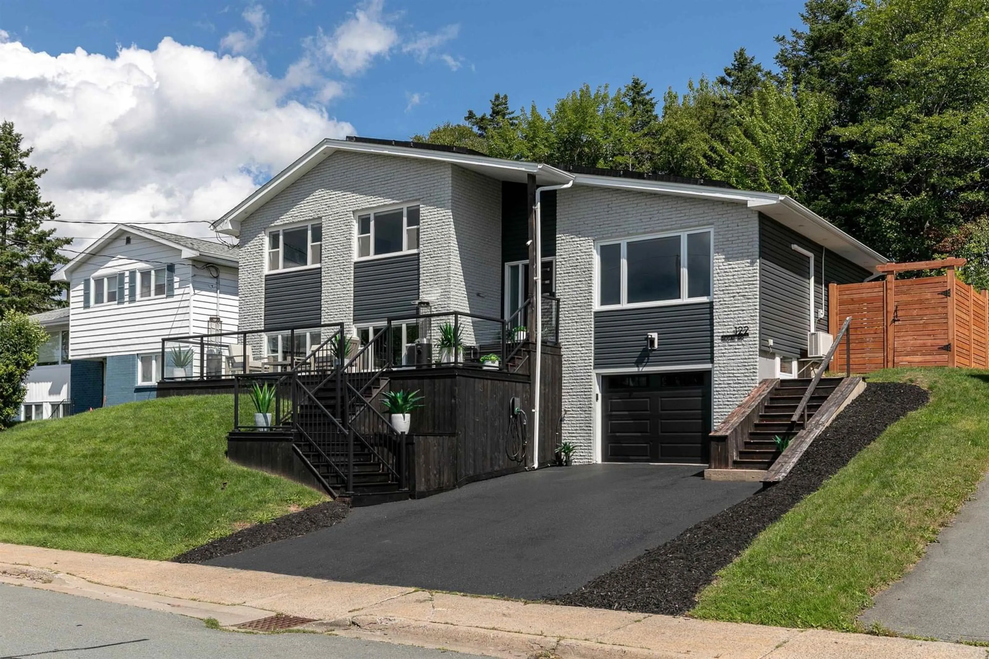 Home with vinyl exterior material, street for 122 Regal Rd, Dartmouth Nova Scotia B2W 4H8