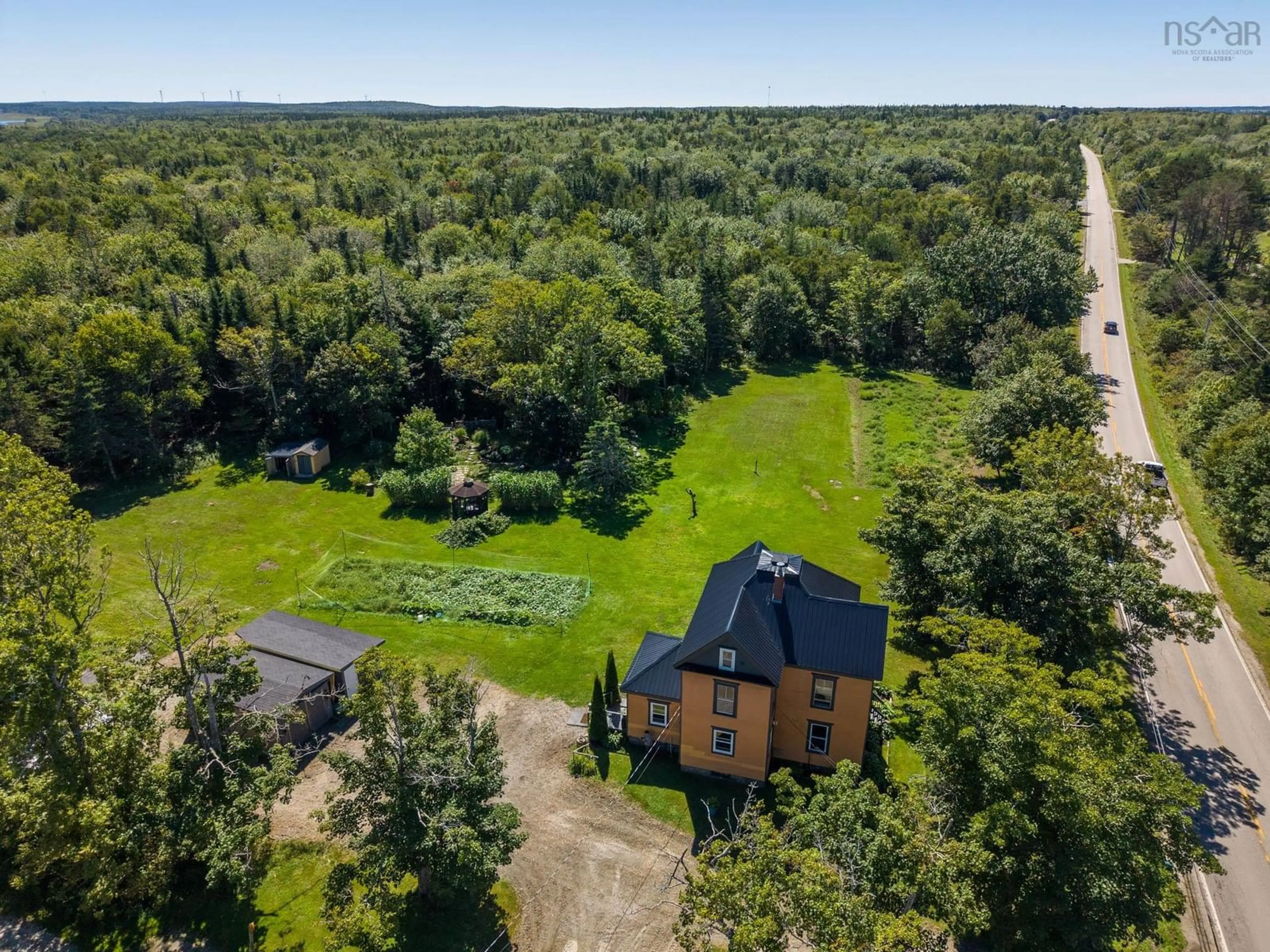 A pic from outside/outdoor area/front of a property/back of a property/a pic from drone, forest/trees view for 9347 Highway 3, Pleasant Lake Nova Scotia B5A 5J9