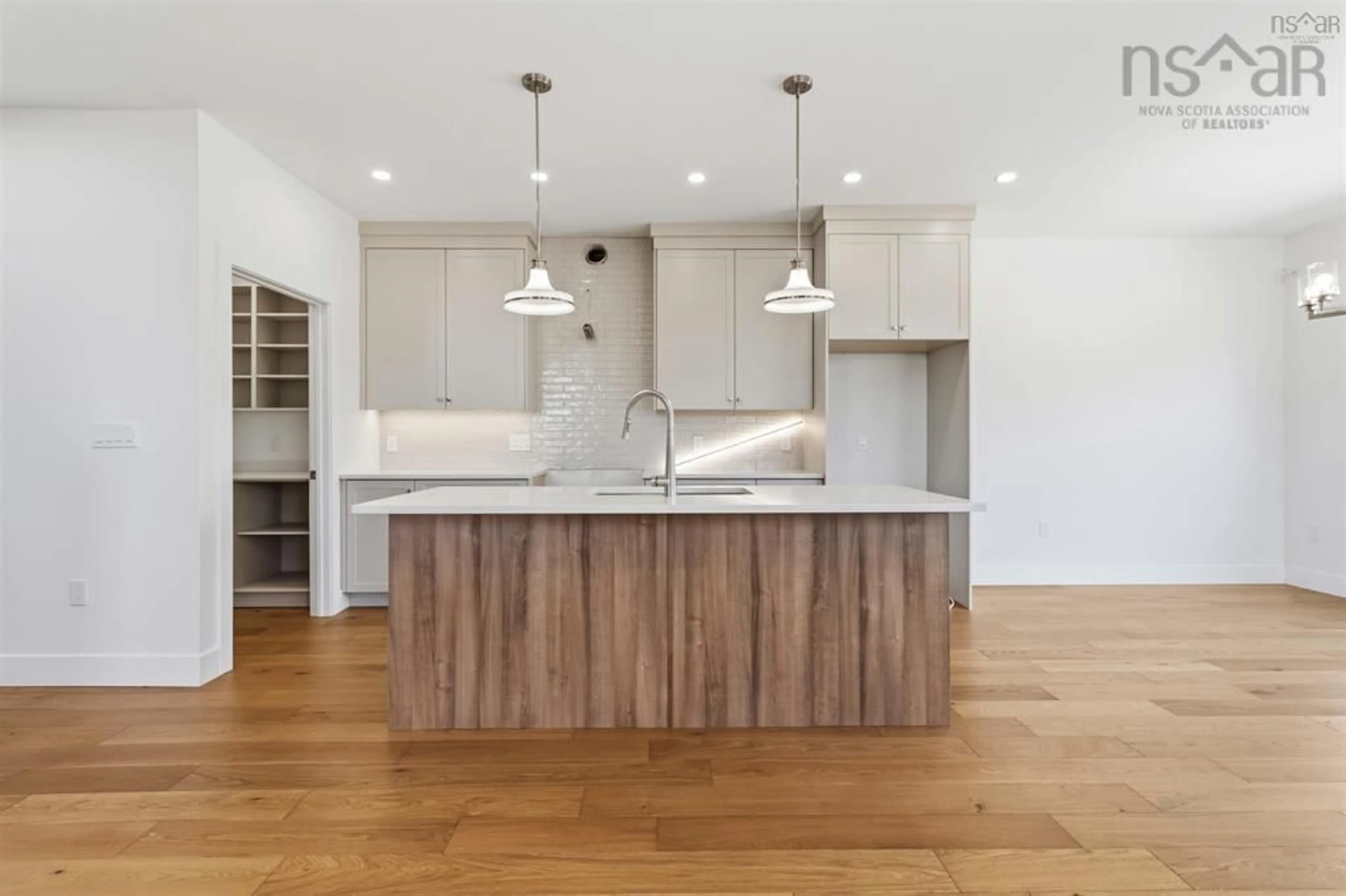 Open concept kitchen, wood/laminate floor for 209 Lewis Dr #LW14, Bedford Nova Scotia B4B 0L3