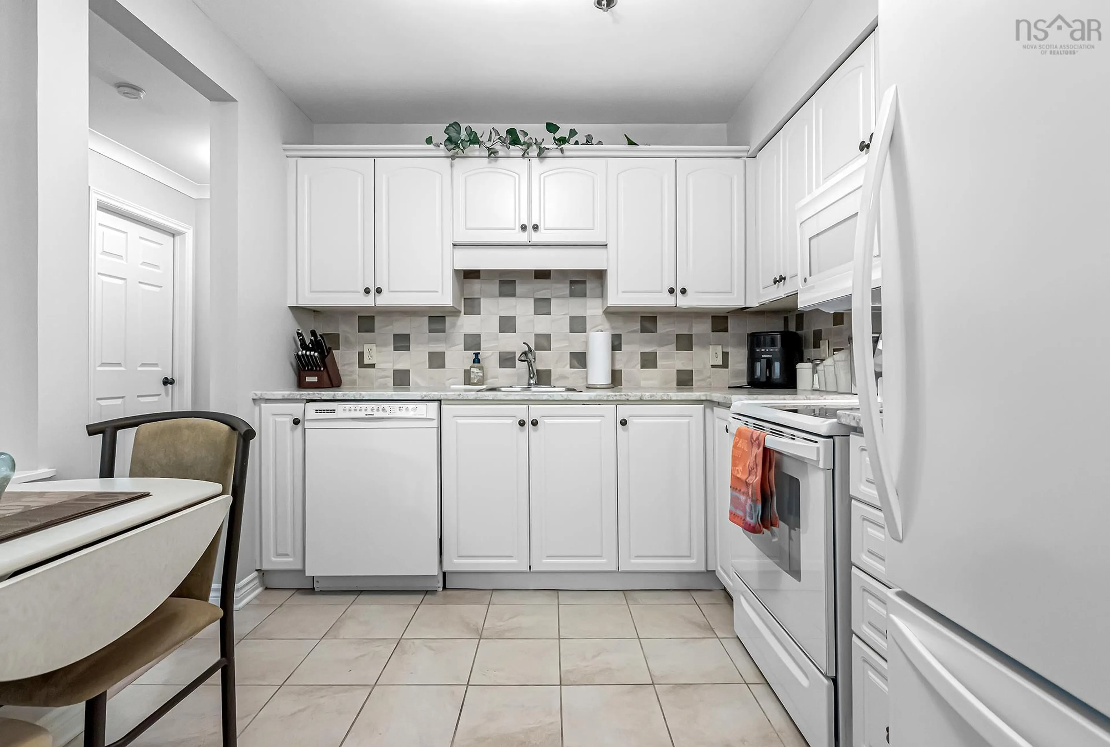 Standard kitchen, ceramic/tile floor for 93 Kearney Lake Rd #308, Halifax Nova Scotia B3M 4B7