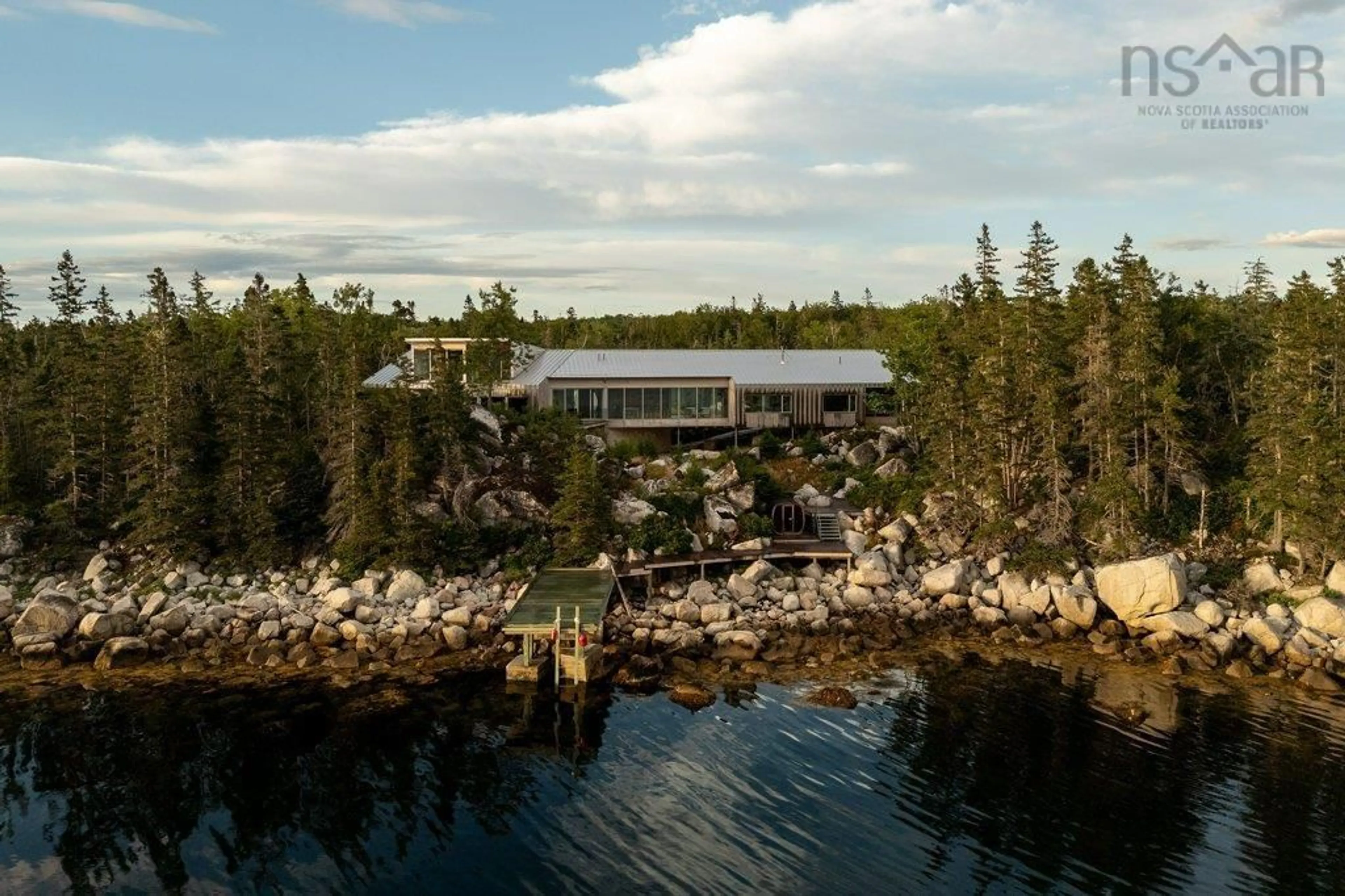 A pic from outside/outdoor area/front of a property/back of a property/a pic from drone, water/lake/river/ocean view for 6949 Highway 329, East River Point Nova Scotia B0J 1T0