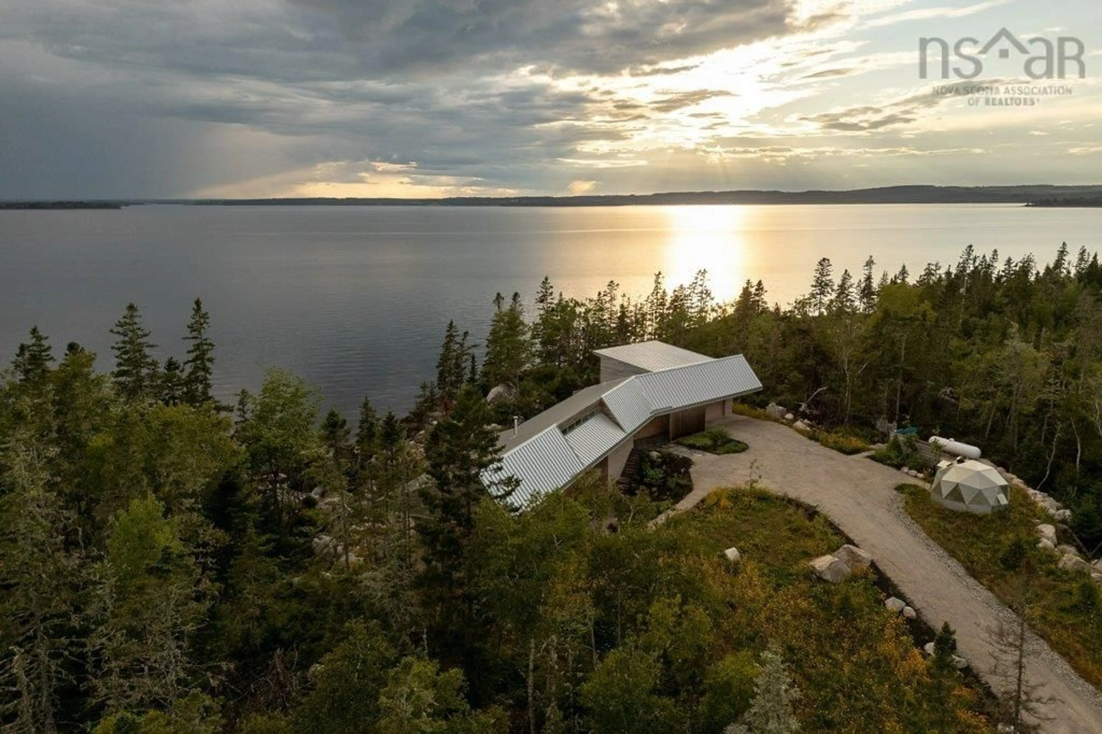 A pic from outside/outdoor area/front of a property/back of a property/a pic from drone, water/lake/river/ocean view for 6949 Highway 329, East River Point Nova Scotia B0J 1T0