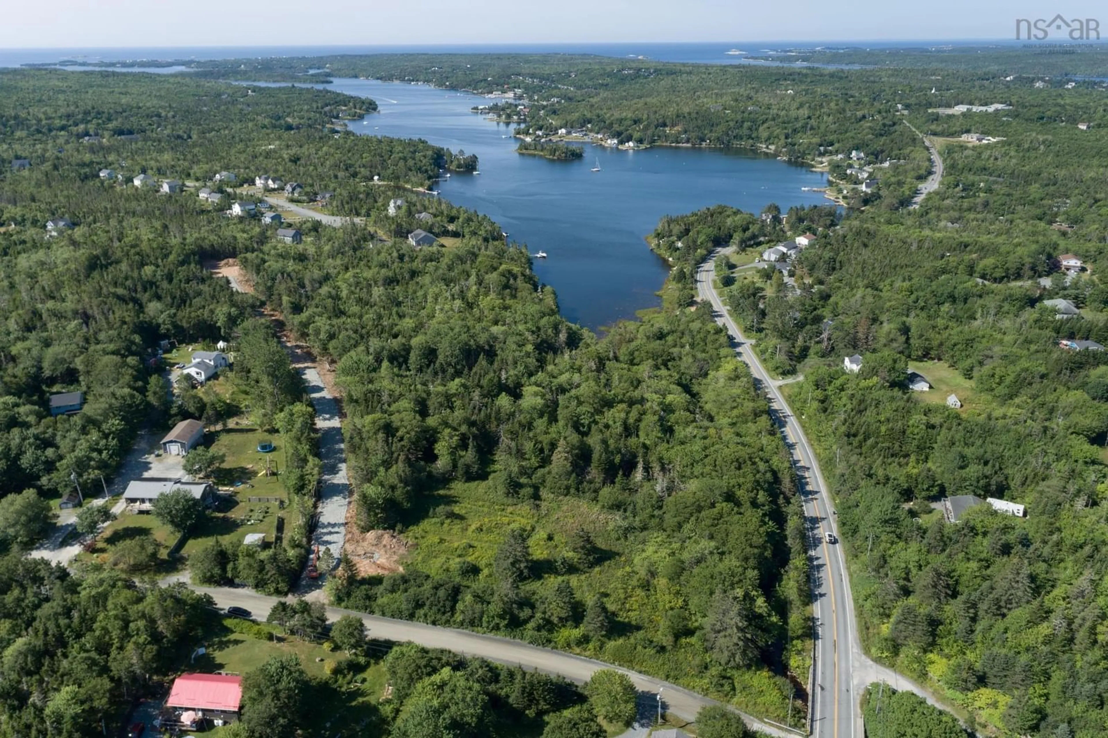 A pic from outside/outdoor area/front of a property/back of a property/a pic from drone, water/lake/river/ocean view for 8 All Hallows Dr #Lot, Whites Lake Nova Scotia B3T 1W3