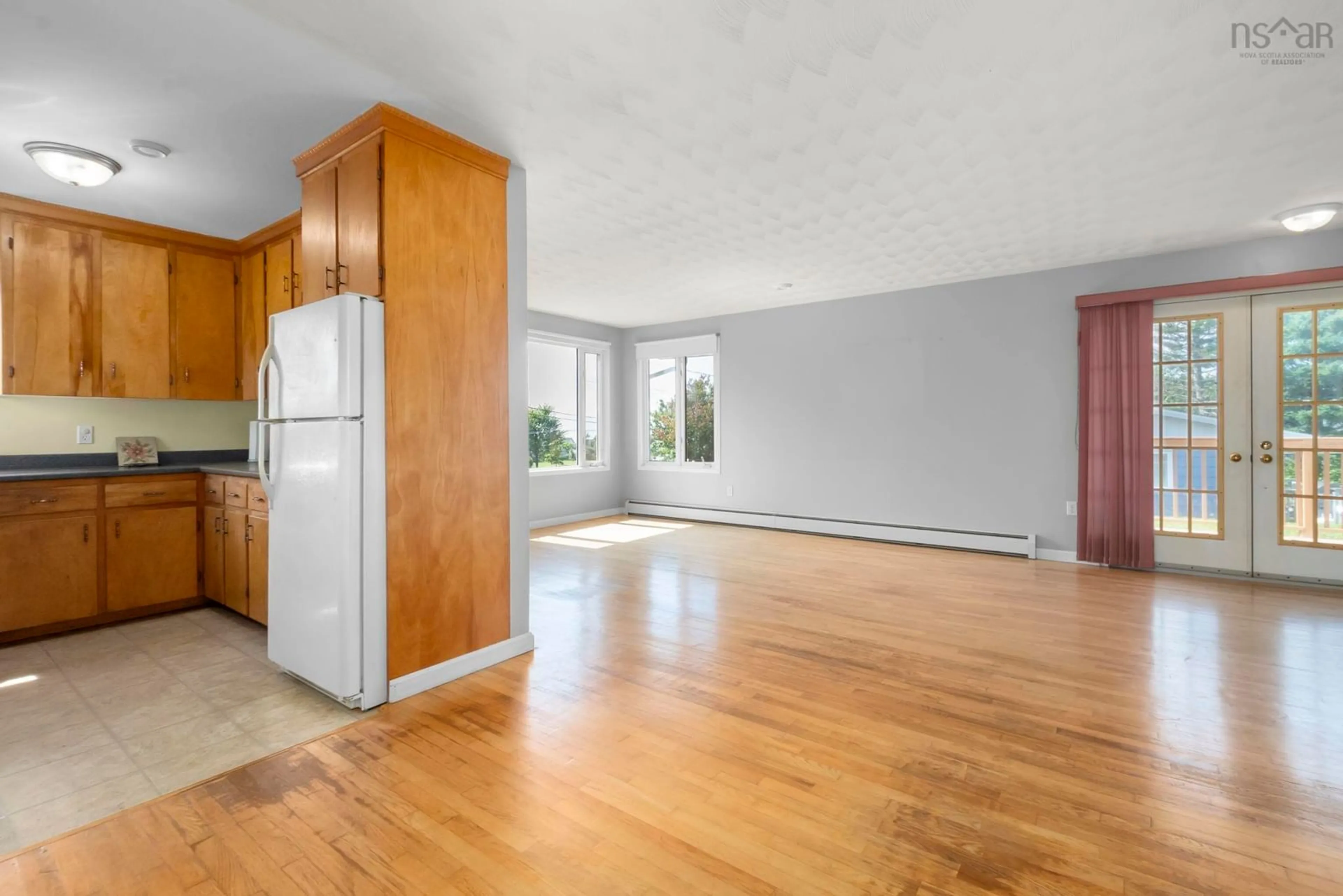 Open concept kitchen, wood/laminate floor for 46 Himmelman Dr, Eastern Passage Nova Scotia B3G 1H8