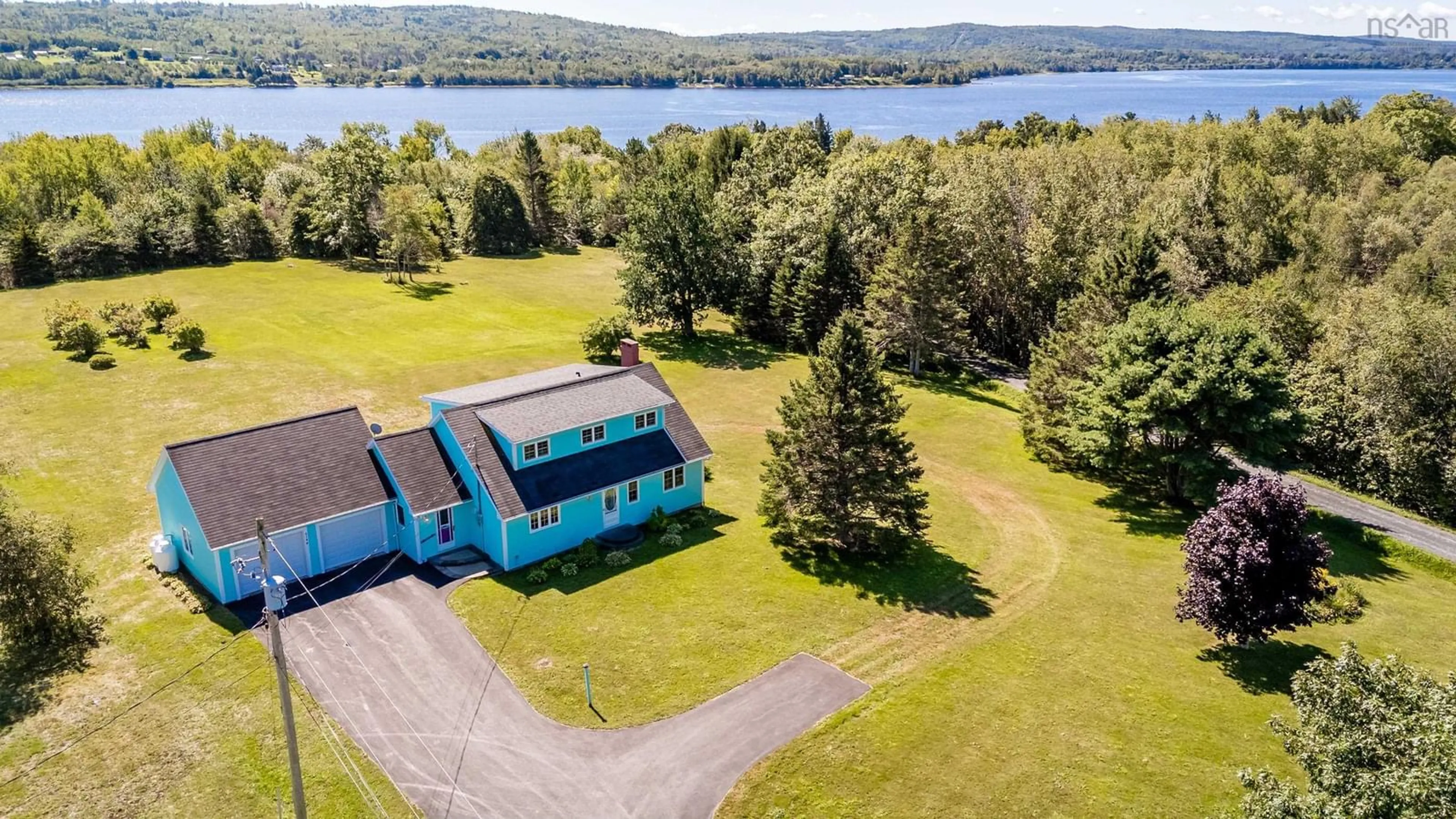 A pic from outside/outdoor area/front of a property/back of a property/a pic from drone, water/lake/river/ocean view for 5148 Highway 1, Granville Centre Nova Scotia B0S 1A0