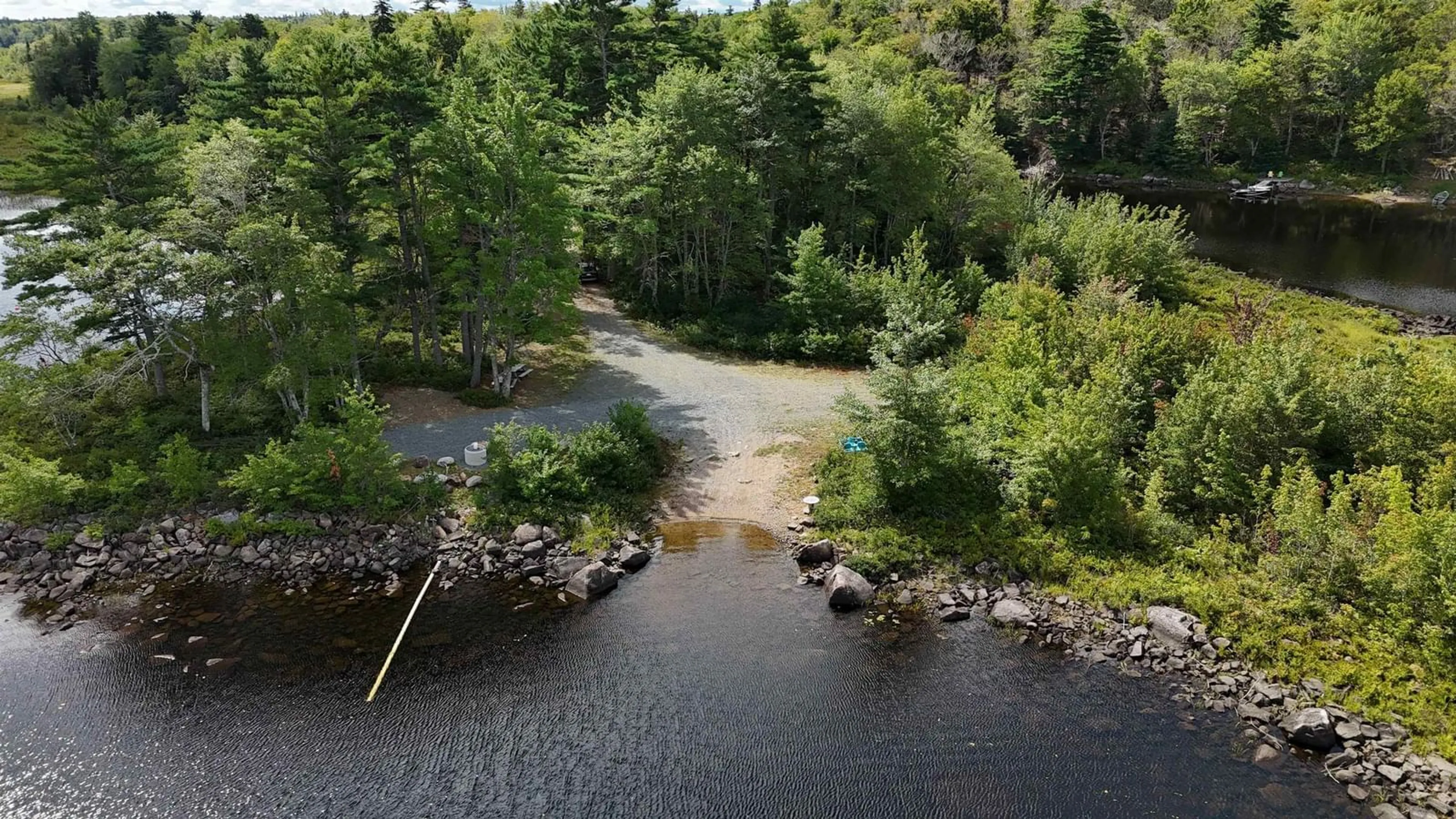 A pic from outside/outdoor area/front of a property/back of a property/a pic from drone, water/lake/river/ocean view for 66 Shore Rd, Walden Nova Scotia B0J 2E0