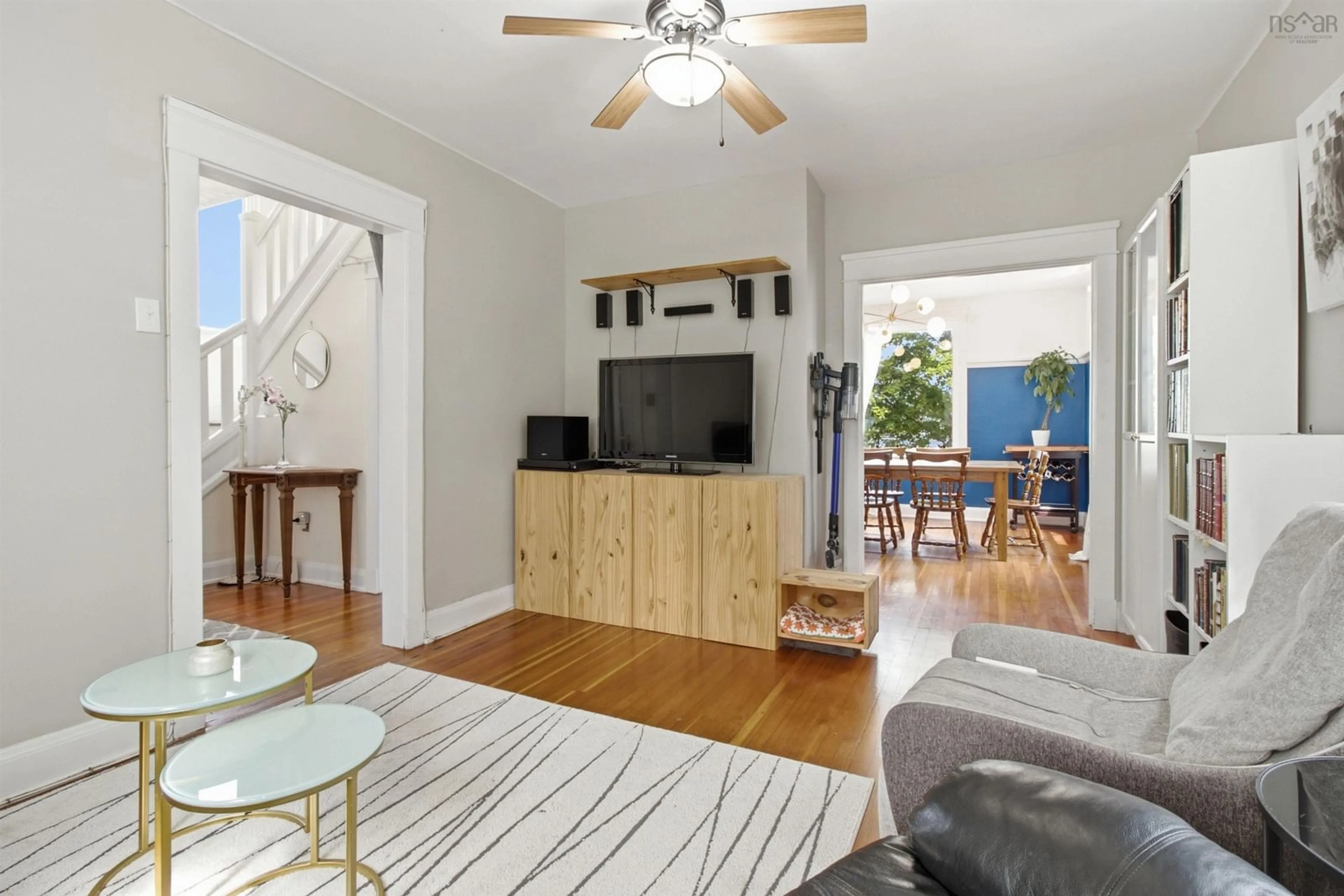 Living room with furniture, wood/laminate floor for 3622 Barrington St, Halifax Nova Scotia B3K 2Y2