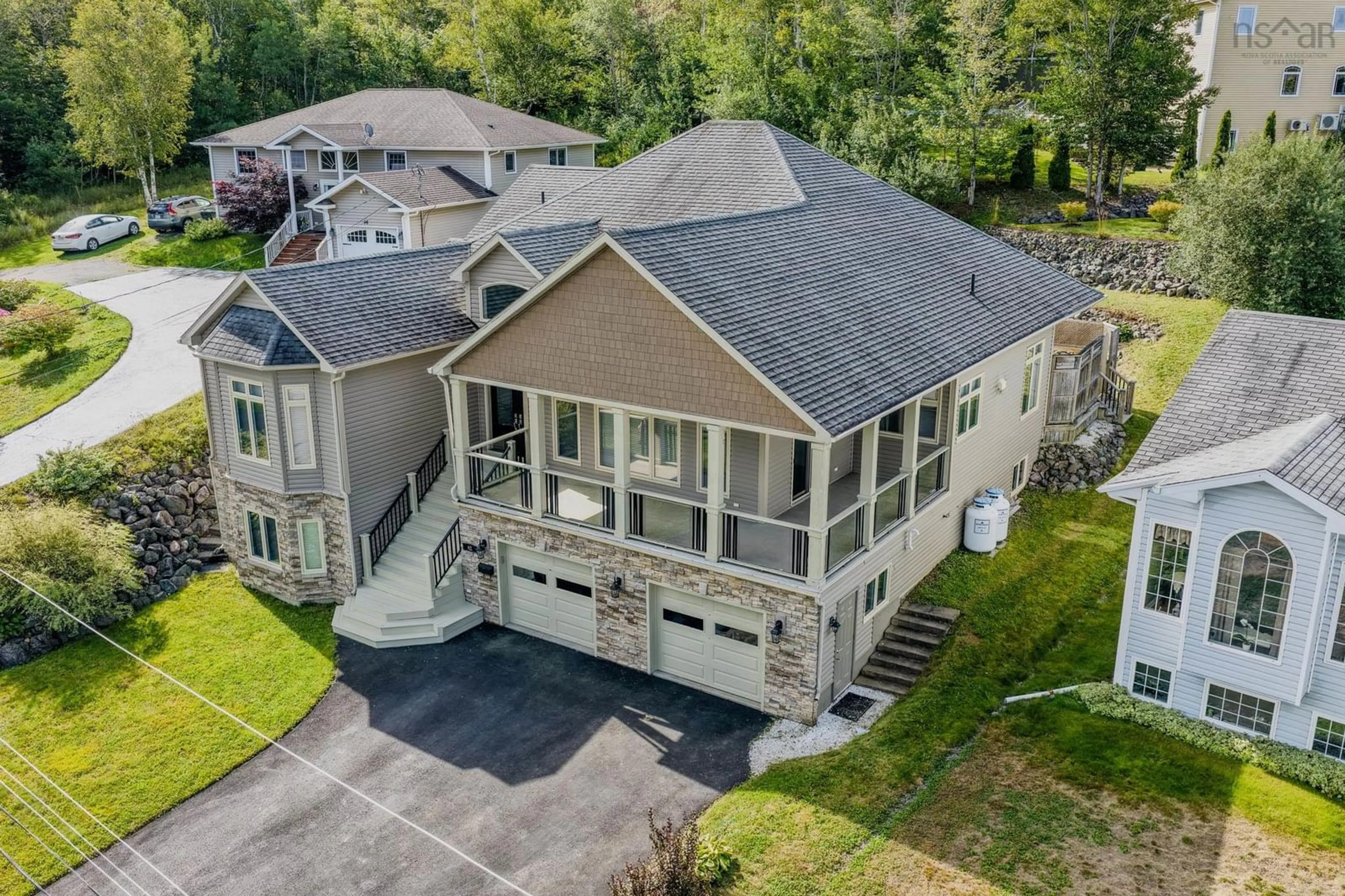 A pic from outside/outdoor area/front of a property/back of a property/a pic from drone, mountain view for 42 Canso Dr, Sydney Nova Scotia B1P 7E5