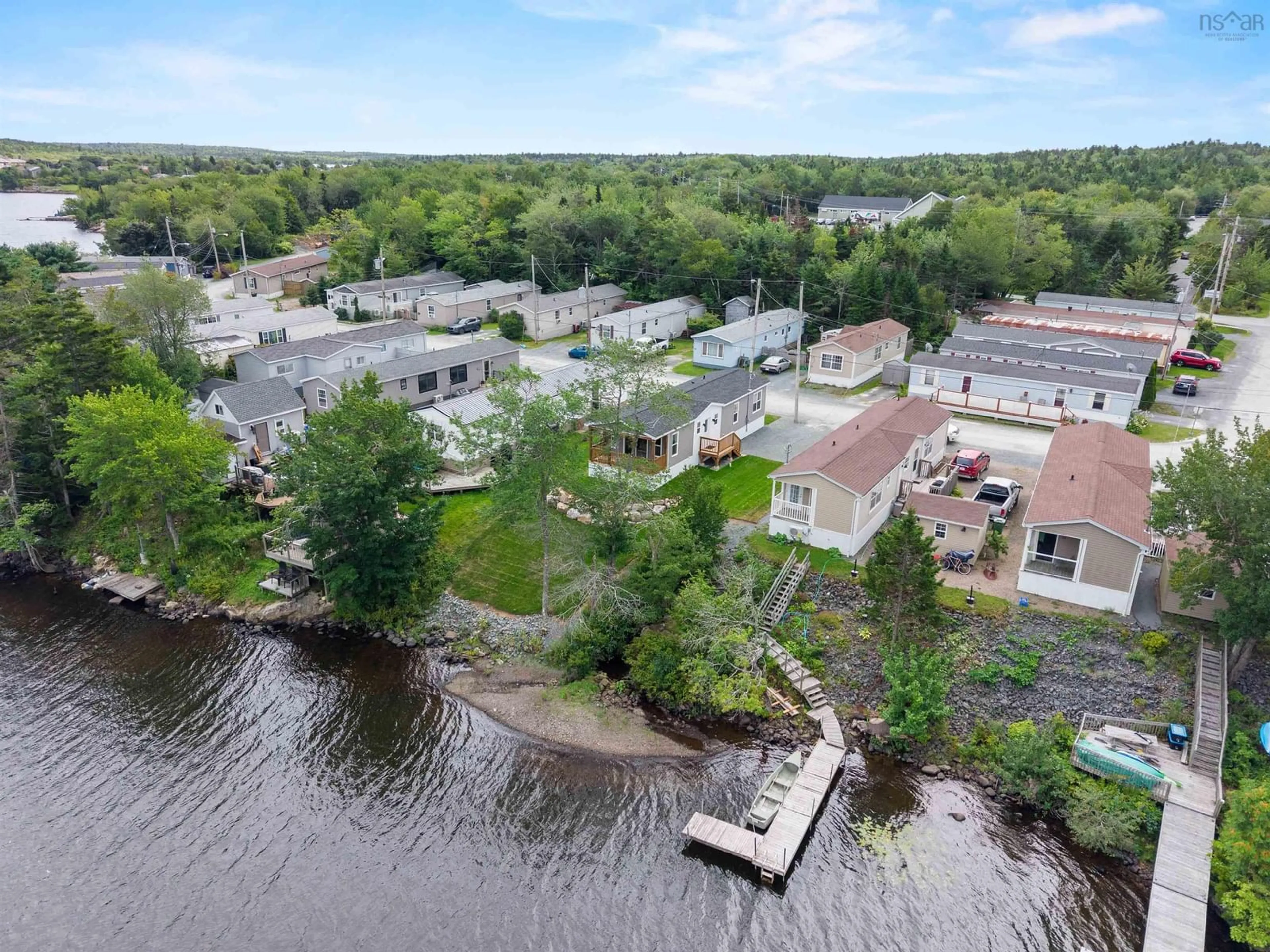A pic from outside/outdoor area/front of a property/back of a property/a pic from drone, water/lake/river/ocean view for 32 Ben Johnson Lane, Timberlea Nova Scotia B3T 1K9