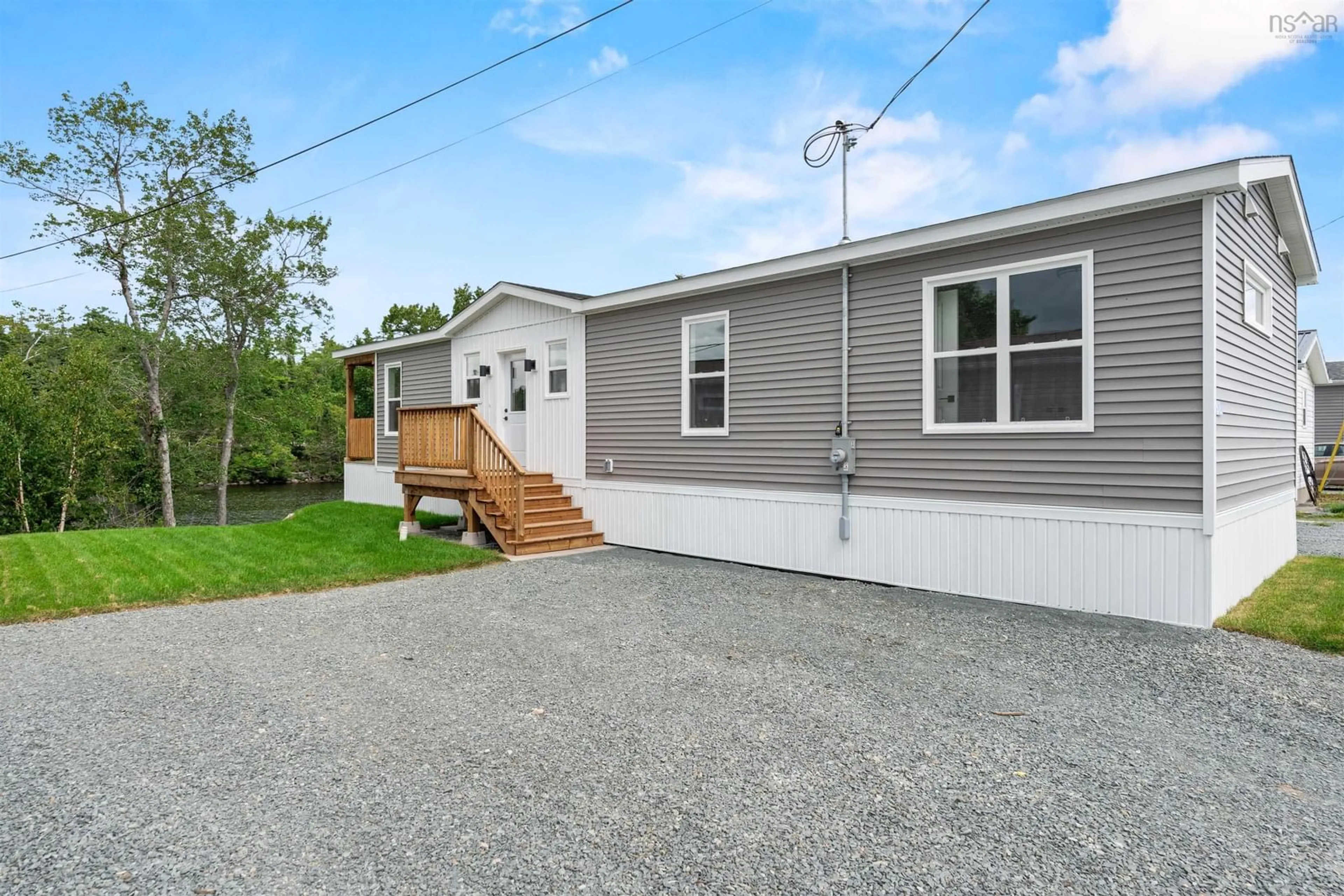 Home with vinyl exterior material, street for 32 Ben Johnson Lane, Timberlea Nova Scotia B3T 1K9