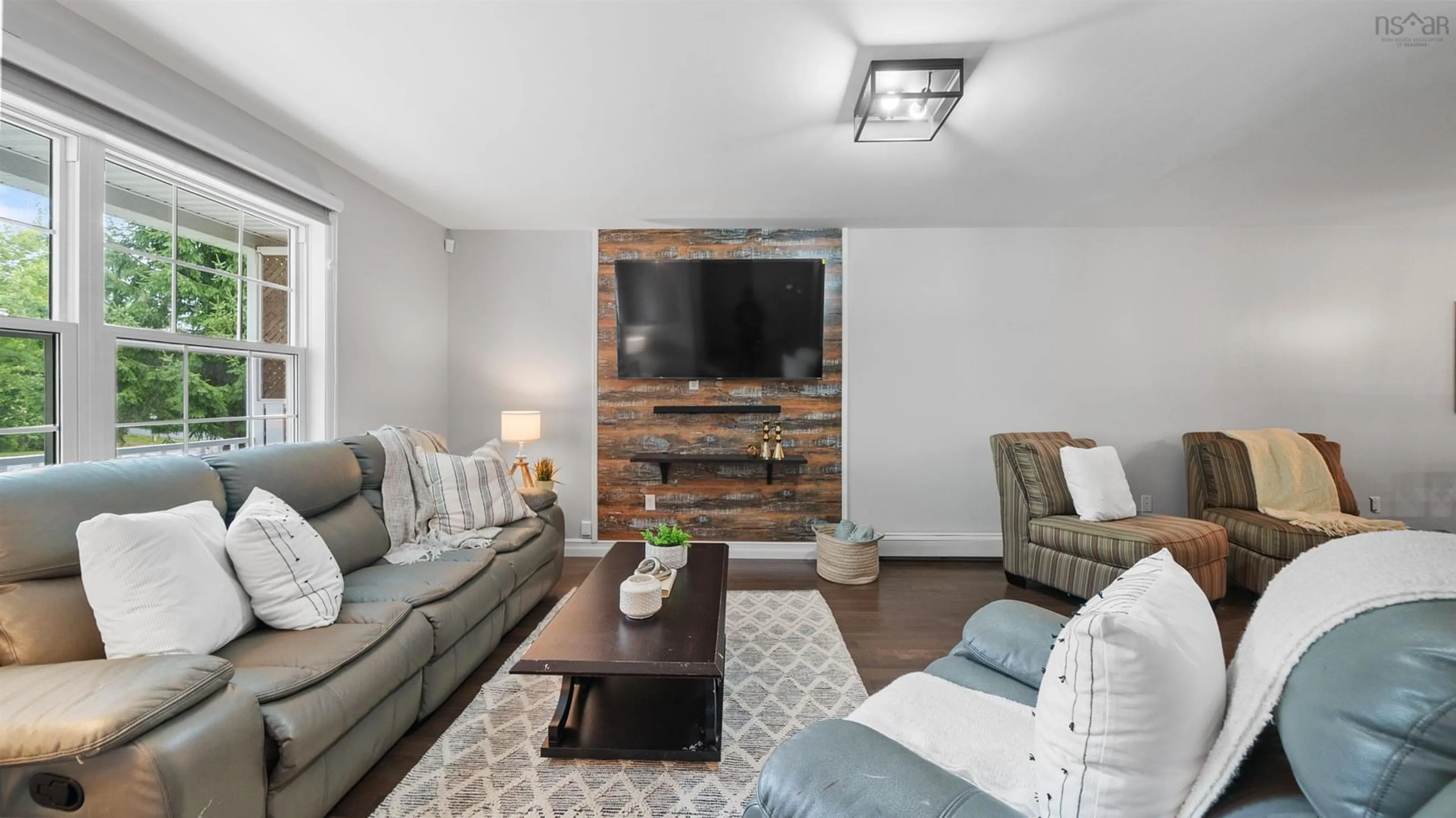 Living room with furniture, wood/laminate floor for 12 Maplewood Dr, Timberlea Nova Scotia B3T 1G1