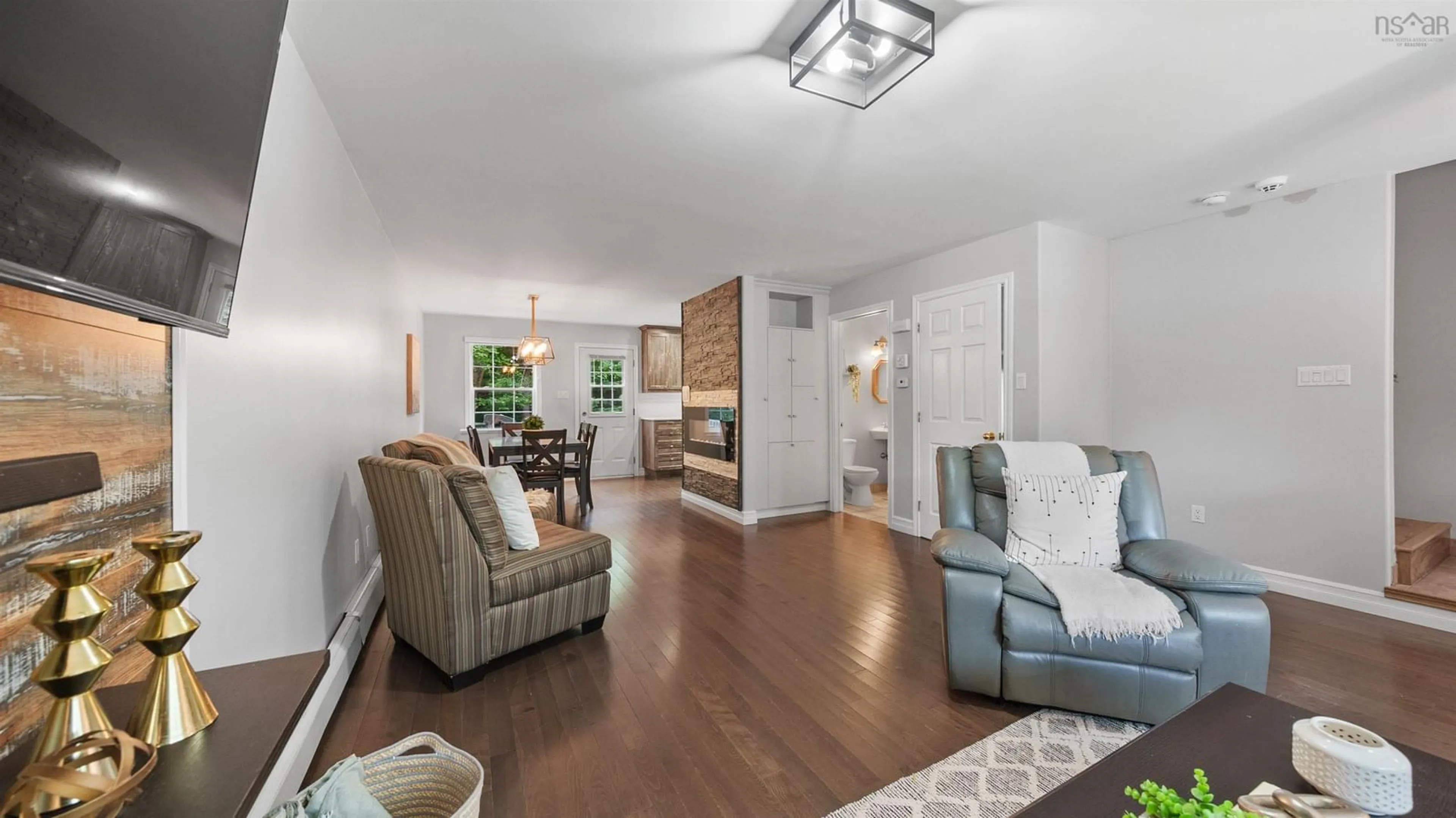 Living room with furniture, wood/laminate floor for 12 Maplewood Dr, Timberlea Nova Scotia B3T 1G1