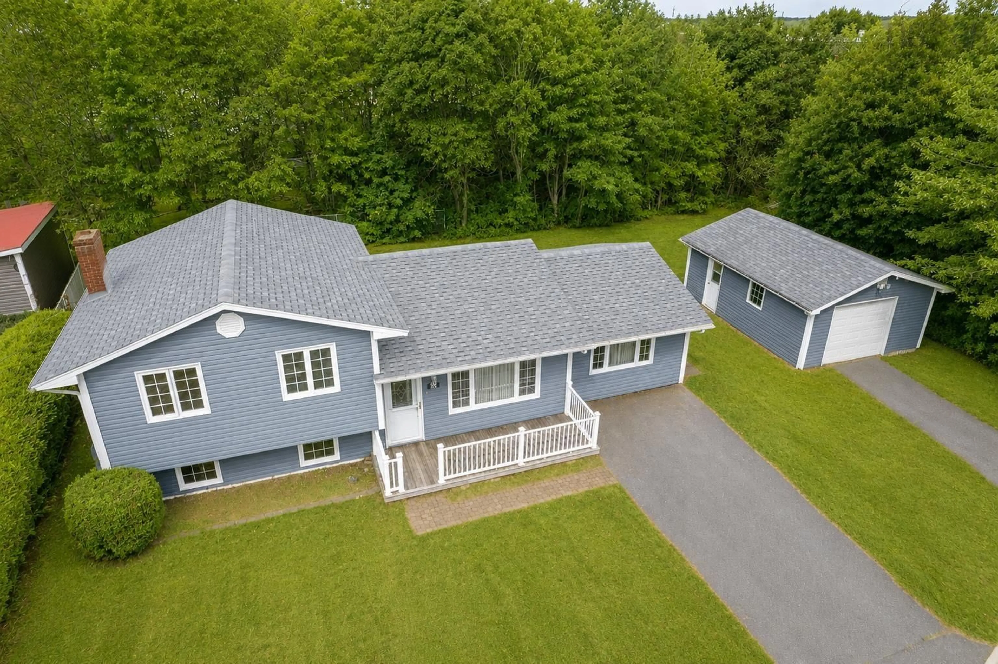 A pic from outside/outdoor area/front of a property/back of a property/a pic from drone, unknown for 54 Acadia Dr, Sydney Nova Scotia B1P 3X7