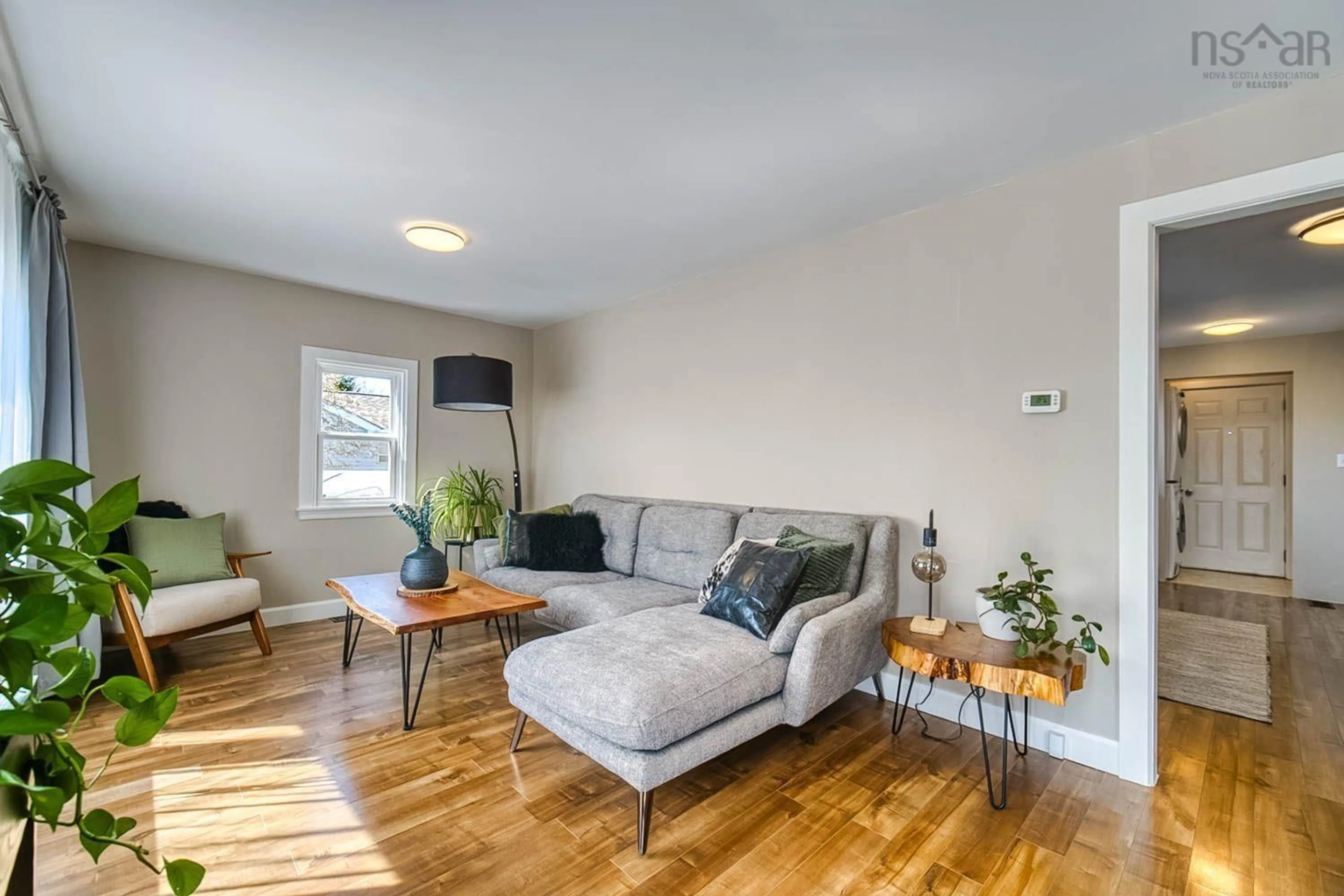 Living room with furniture, wood/laminate floor for 331 Chadwick St, Dartmouth Nova Scotia B2Y 2M2