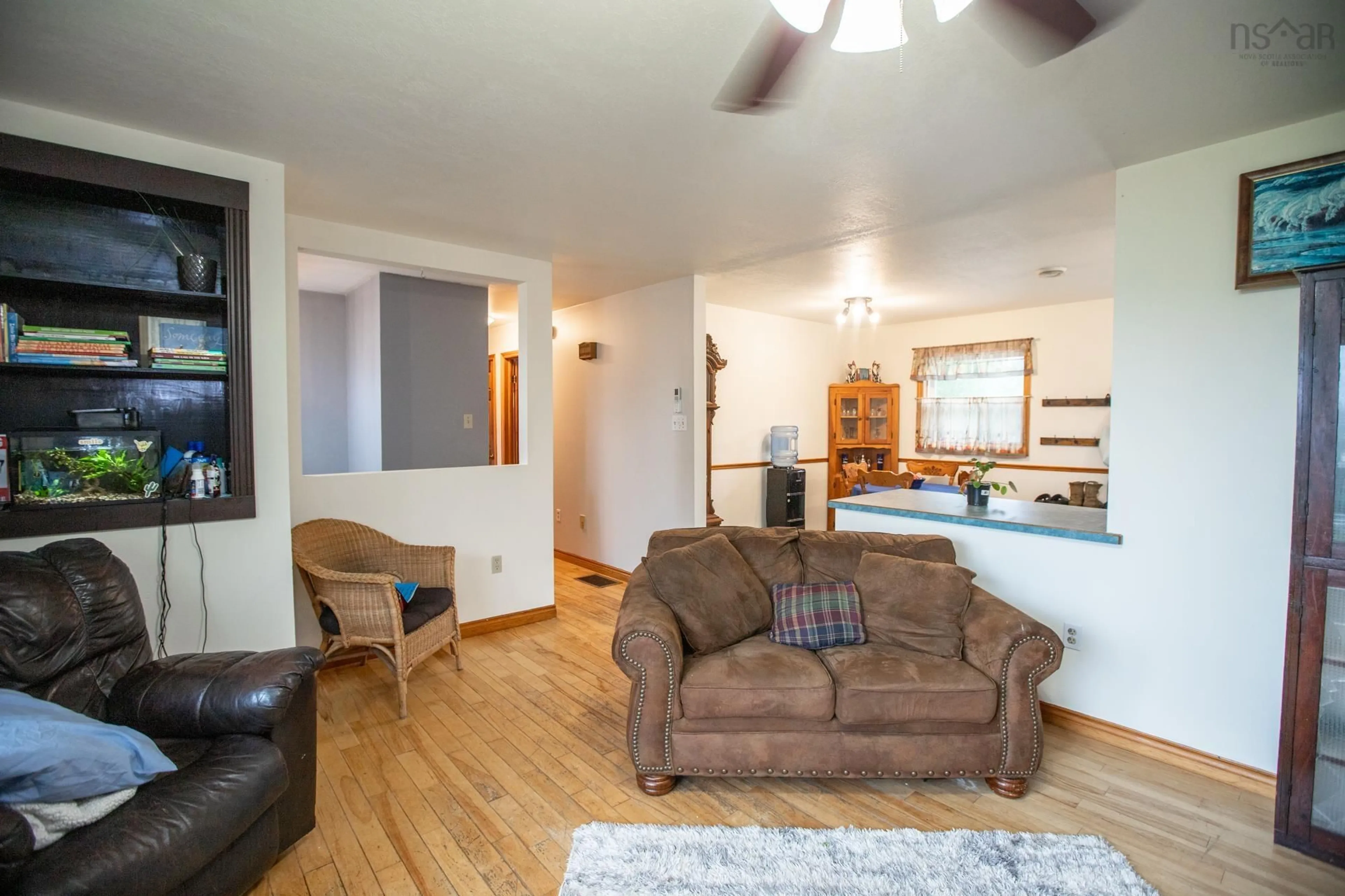 Living room with furniture, wood/laminate floor for 58 Delmerle Dr, Whites Lake Nova Scotia B3T 1W9