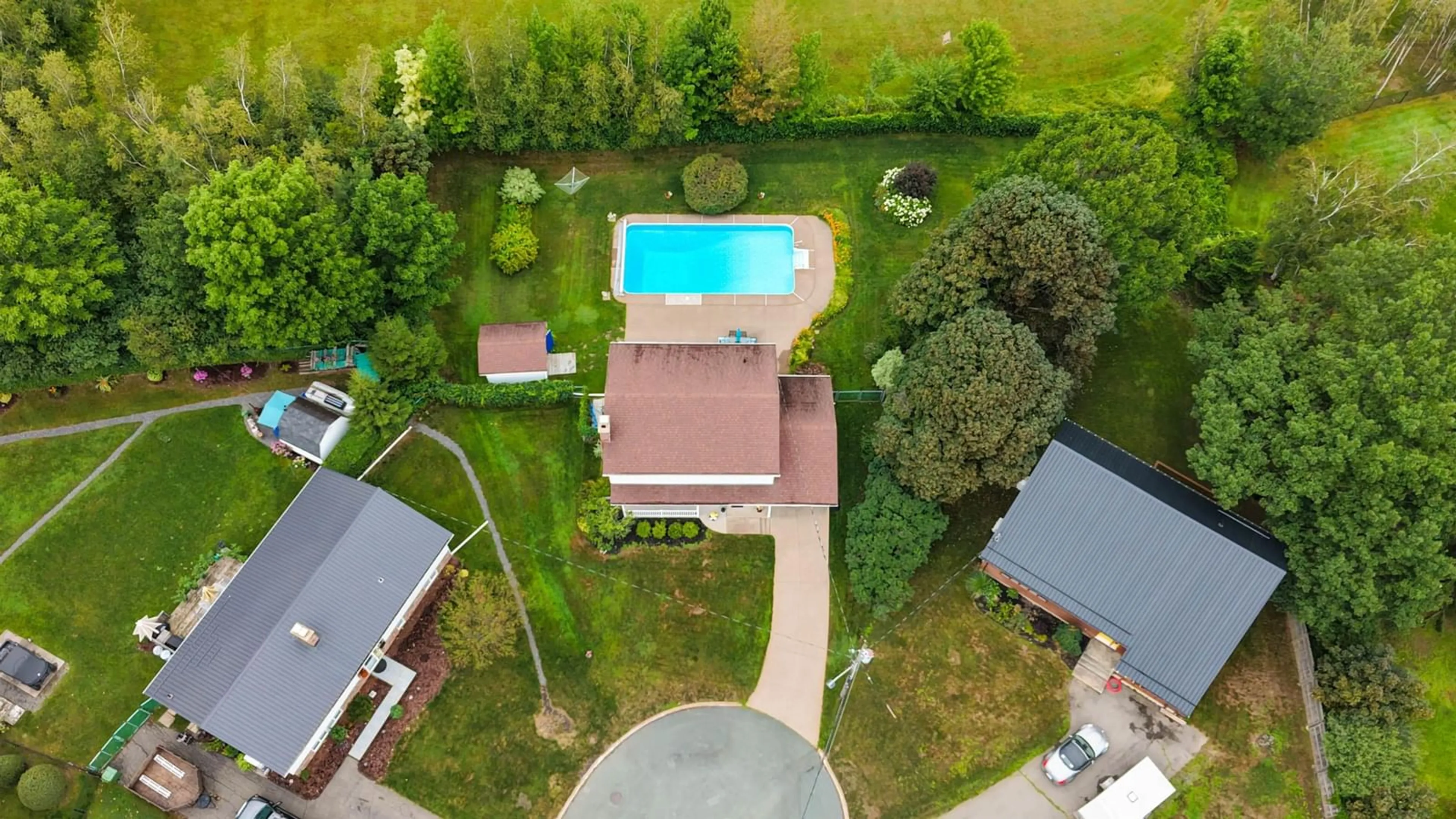 A pic from outside/outdoor area/front of a property/back of a property/a pic from drone, water/lake/river/ocean view for 165 Newbury Crt, New Glasgow Nova Scotia B2H 5N5