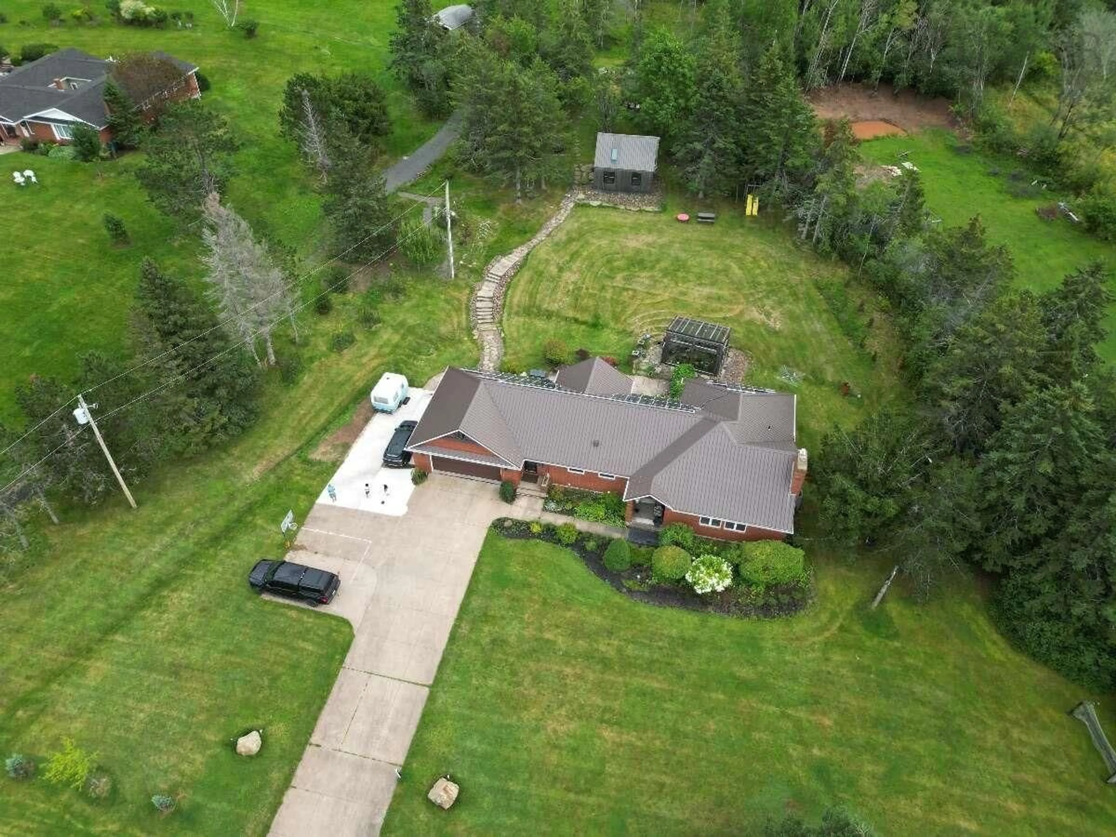 A pic from outside/outdoor area/front of a property/back of a property/a pic from drone, unknown for 411 Mountain Rd, New Glasgow Nova Scotia B2H 3X4
